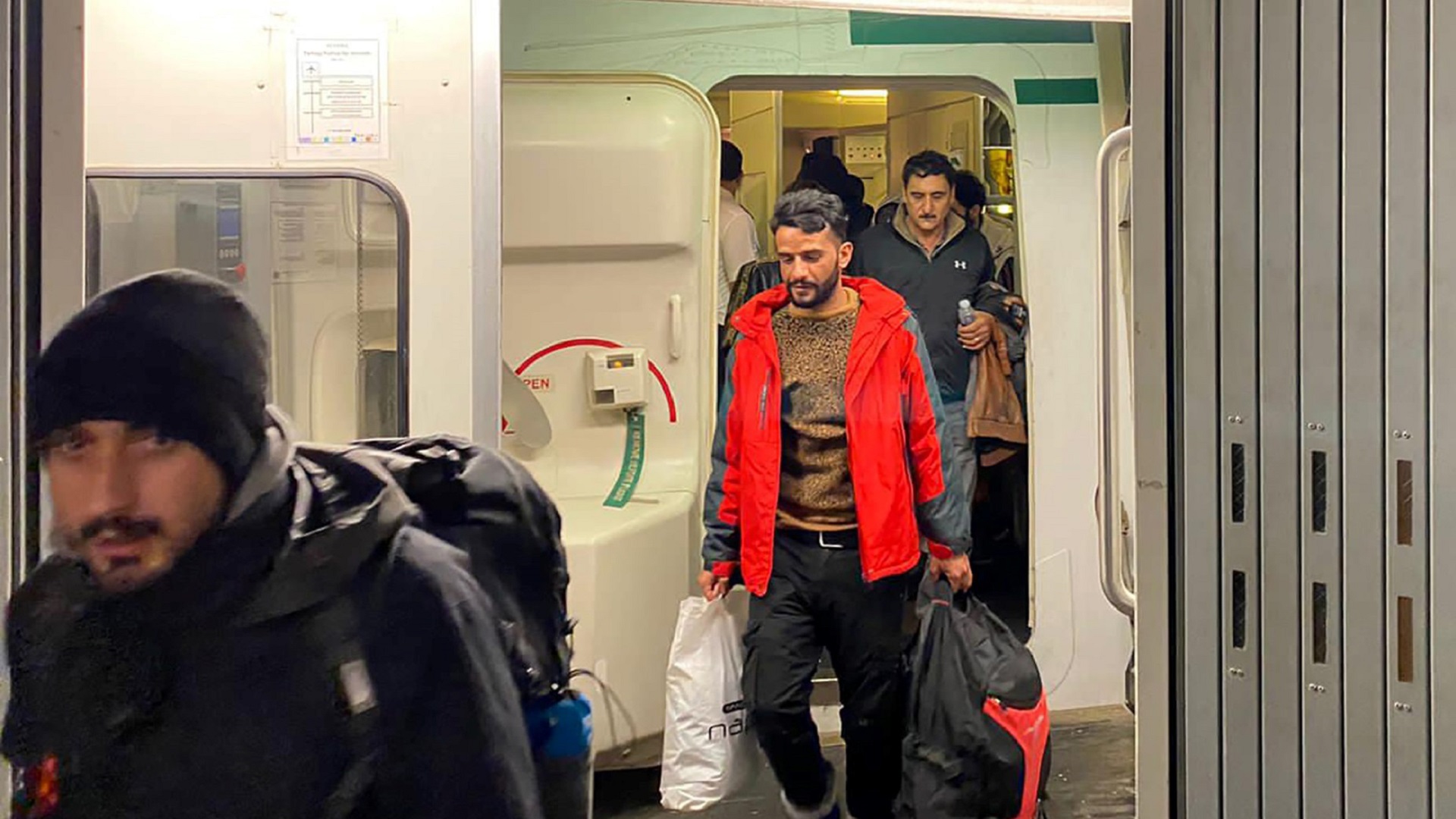 Image for the title: Iraq sends extra planes to Belarus to repatriate migrants 