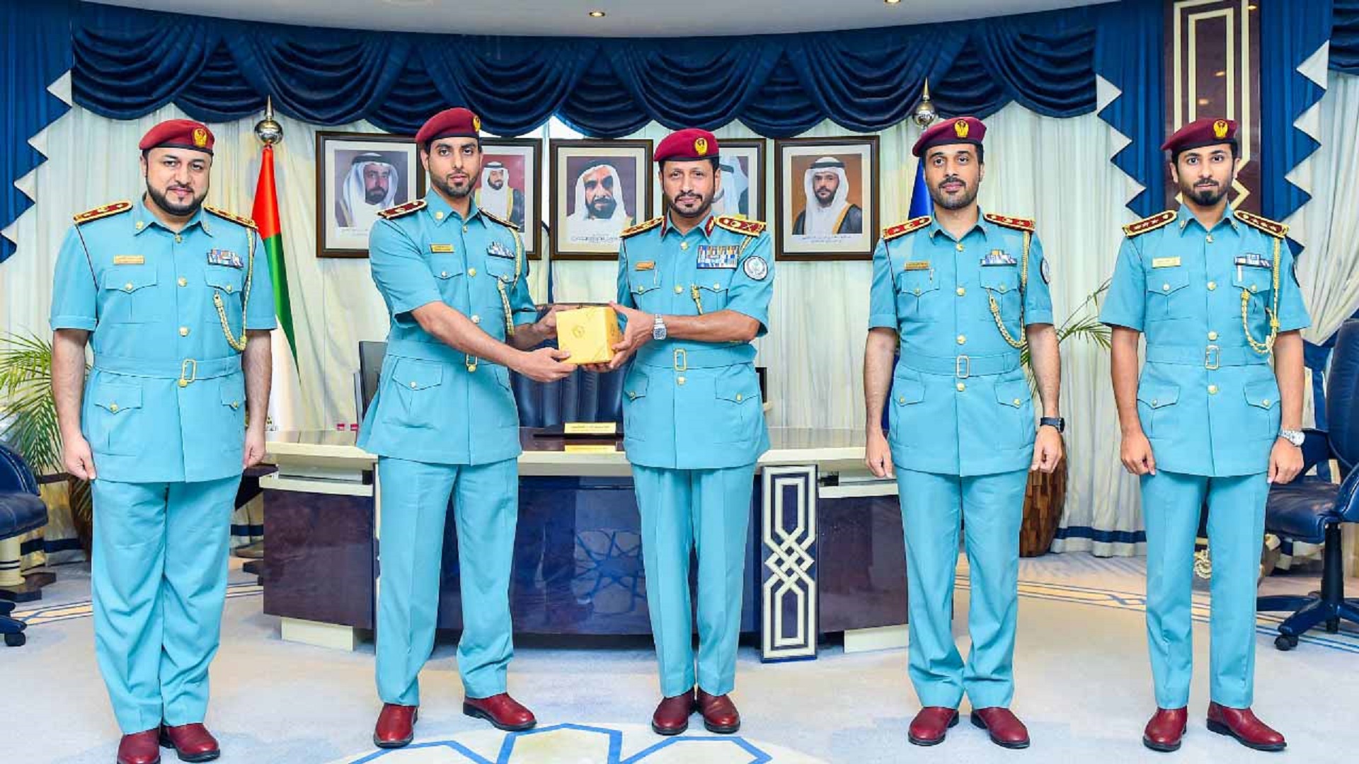 Image for the title: Al Shamsi honours officer for obtaining master's degree 