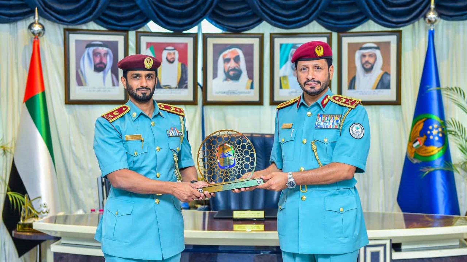 Image for the title: Al Shamsi receives commemorative shield from Al Hamriya Club 