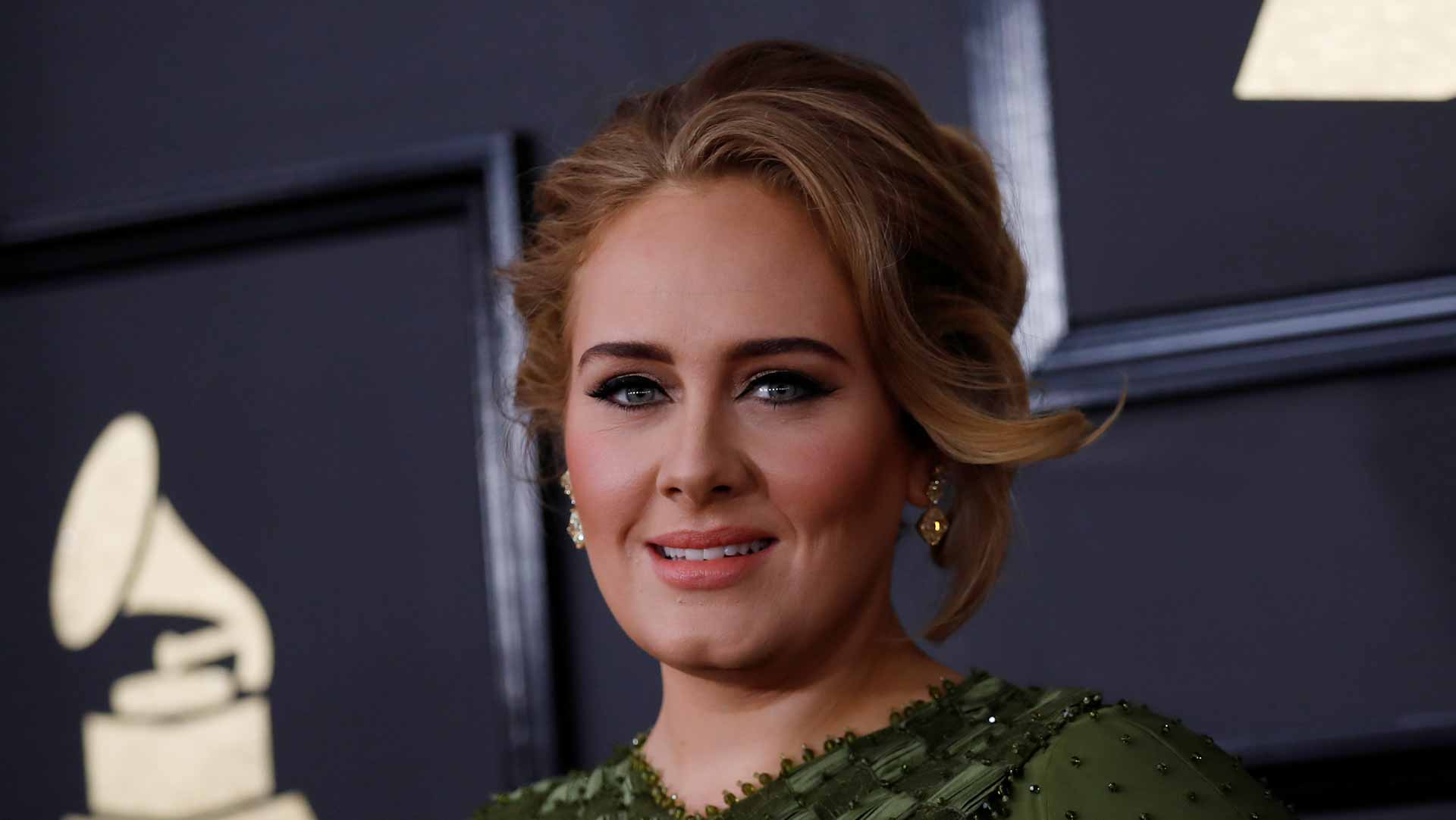 Image for the title: Adele teases new music, sending internet into frenzy 