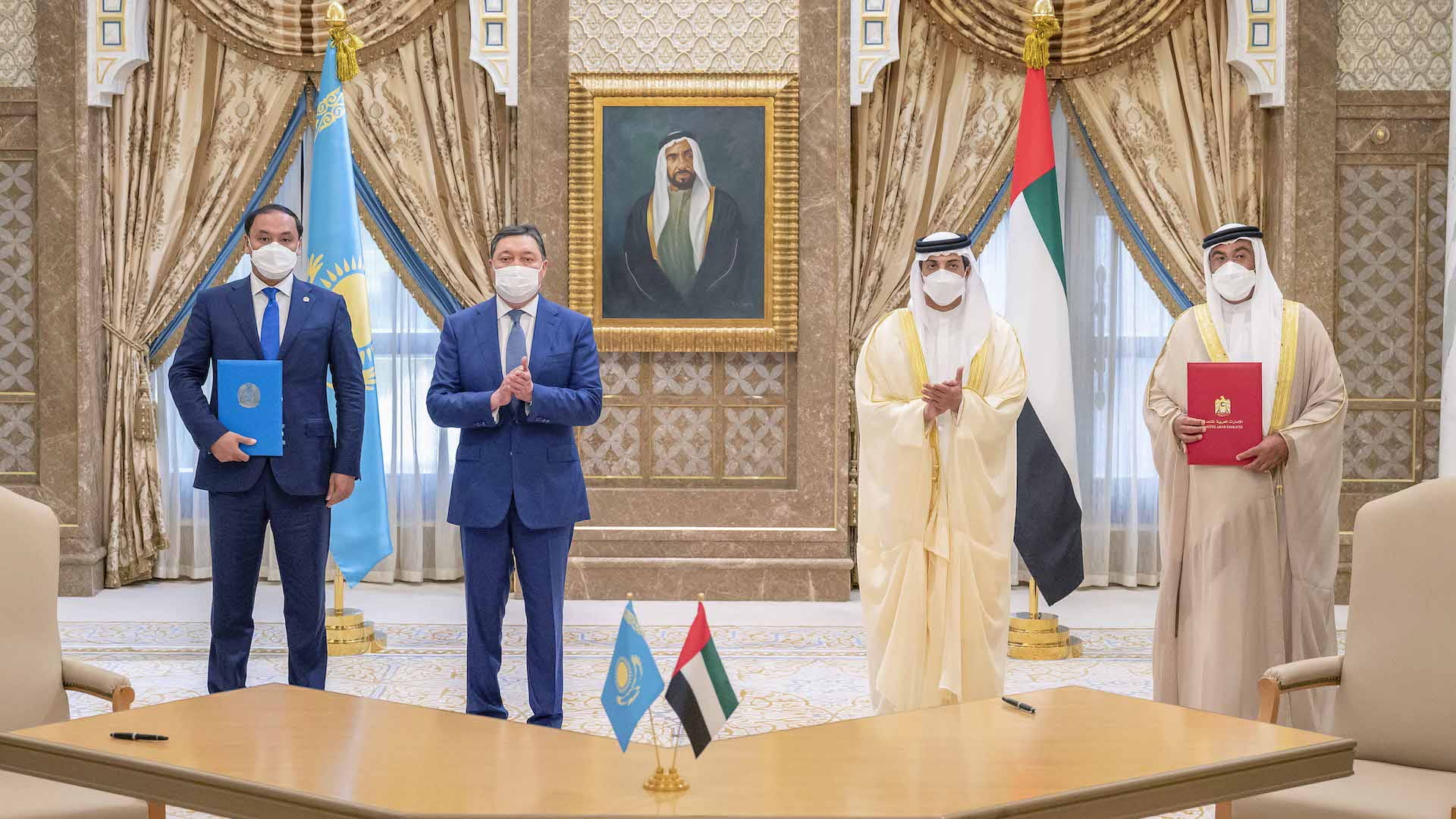 Image for the title: Mansour bin Zayed, Kazakhstan PM witness signing of joint Decl. 