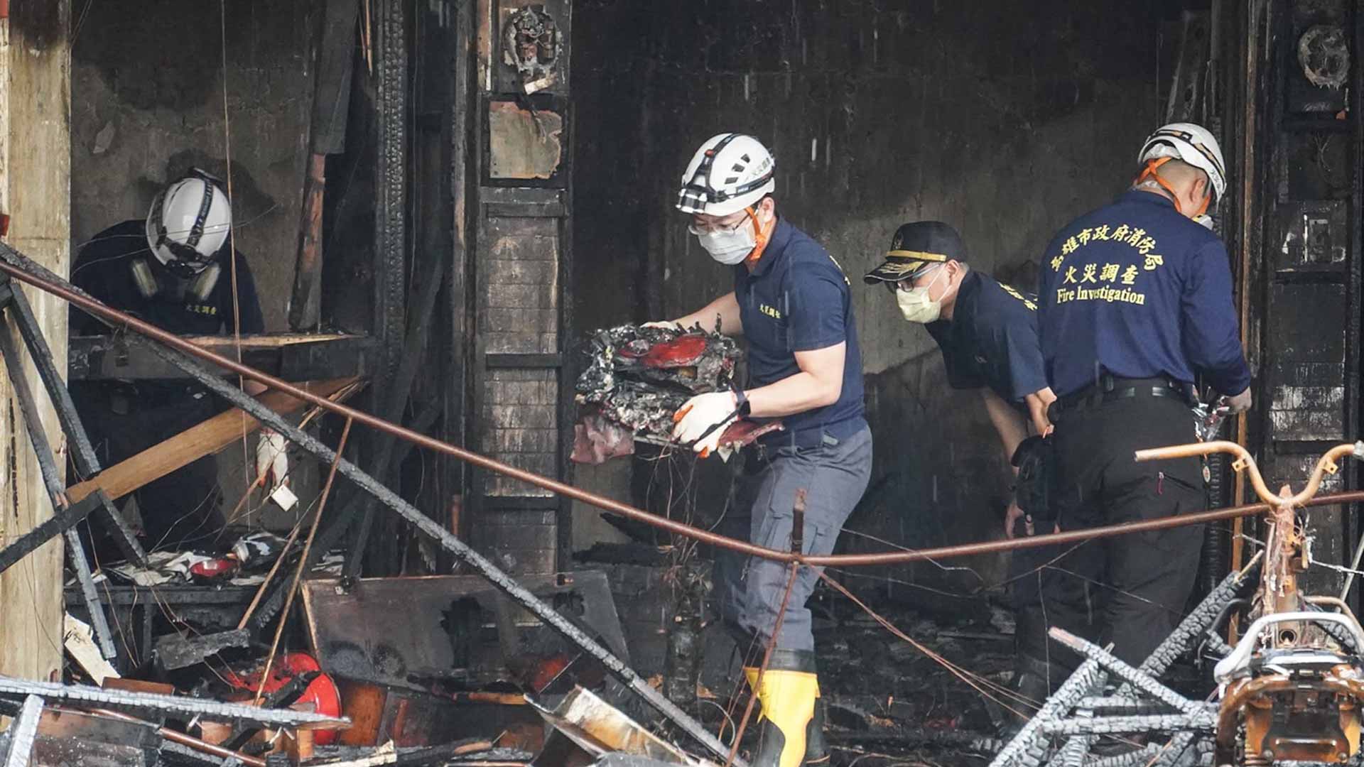 Image for the title: Taiwan building inferno kills 46, dozens injured 