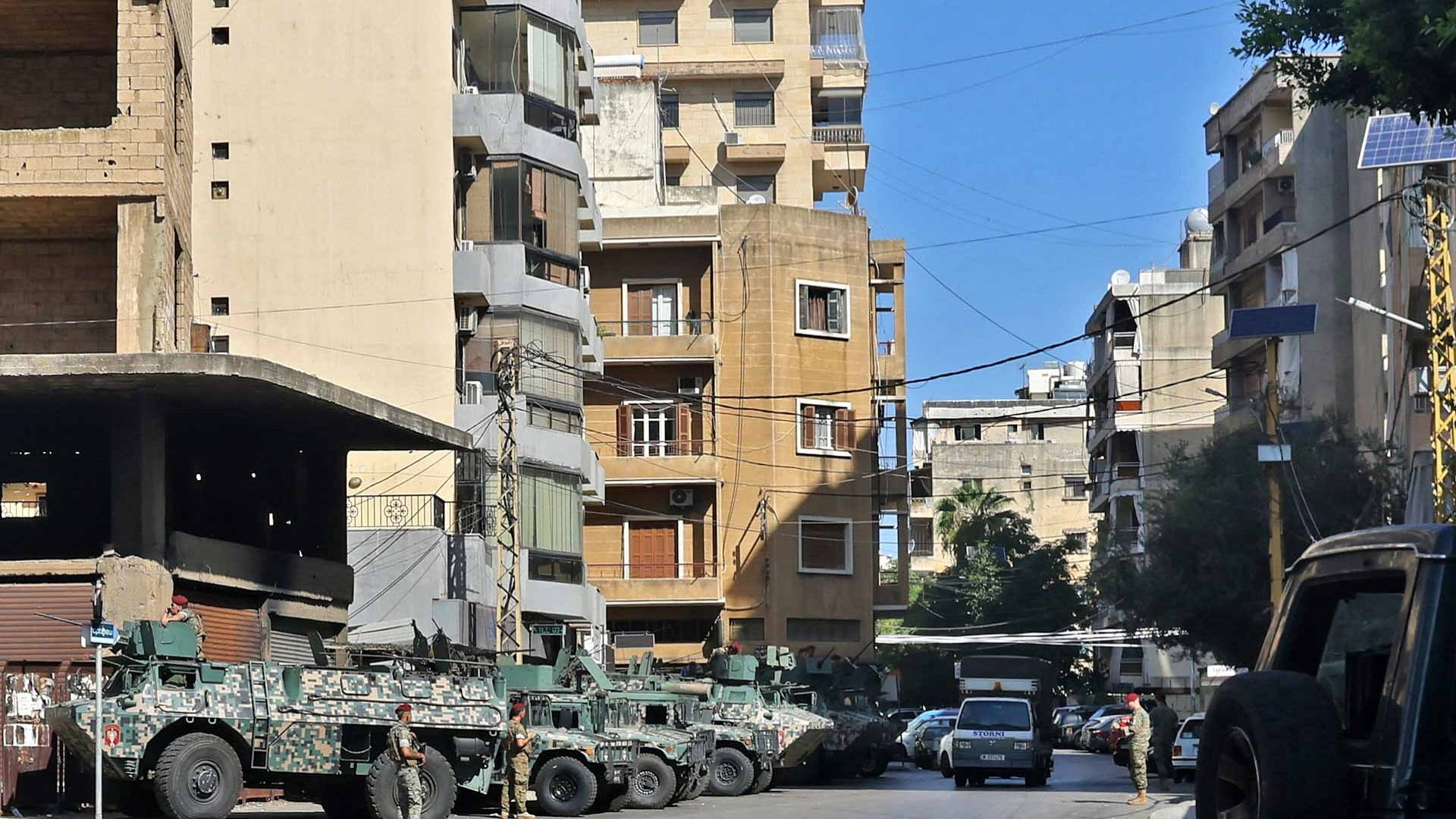 Image for the title: Lebanon pauses amid tense calm after deadly gun battles 