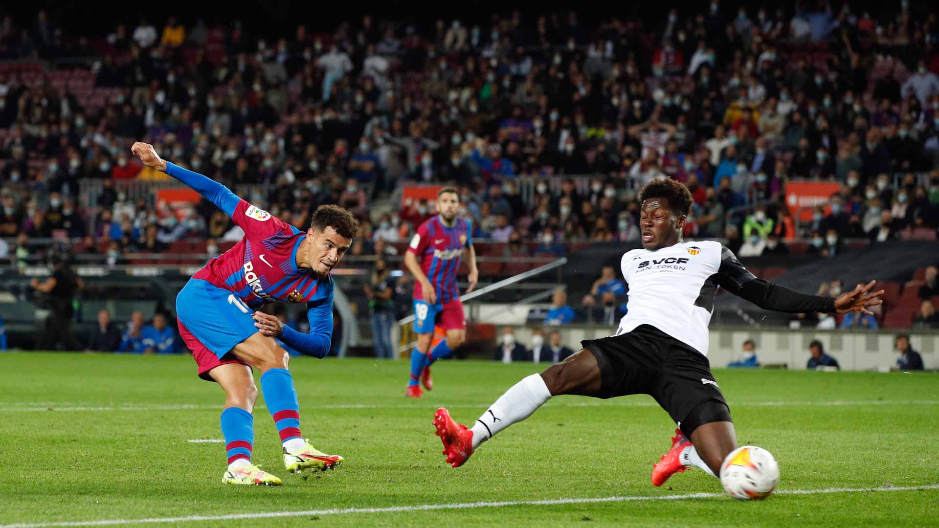 Image for the title: Fati stars on first start in almost a year as Barca beat Valencia 