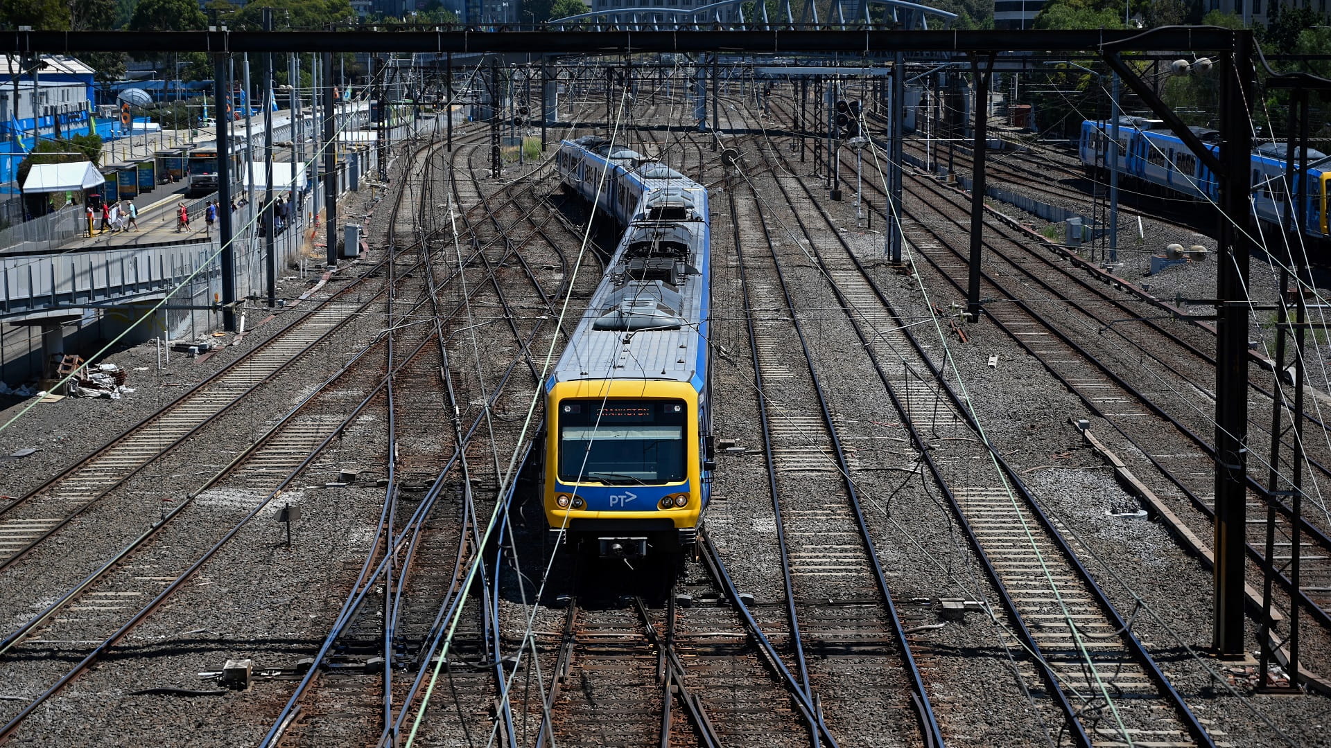 Image for the title: Australian train derails after hitting abandoned vehicle 