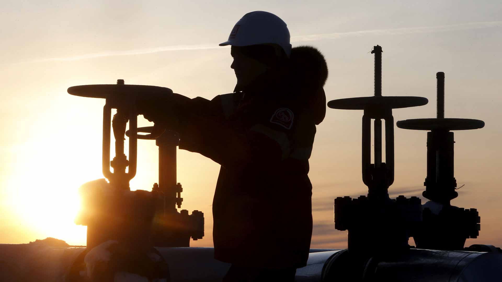 Image for the title: Oil  rises as U.S. crude inventory draw points to strong demand 