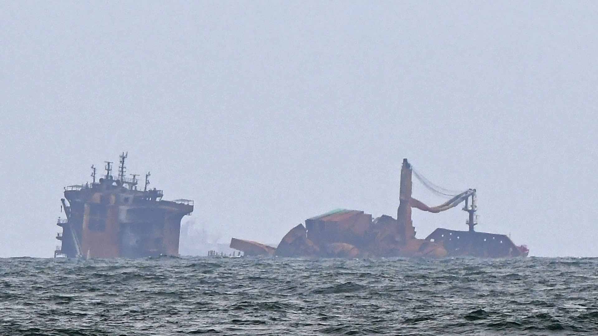 Image for the title: Container ship fire off British Columbia smoldering 