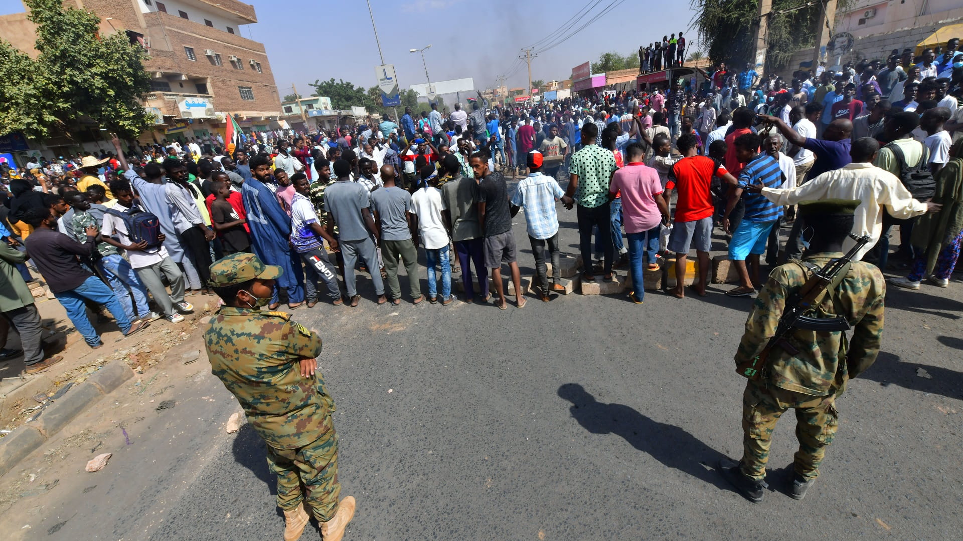 Image for the title: Sudan capital locked down after unrest 