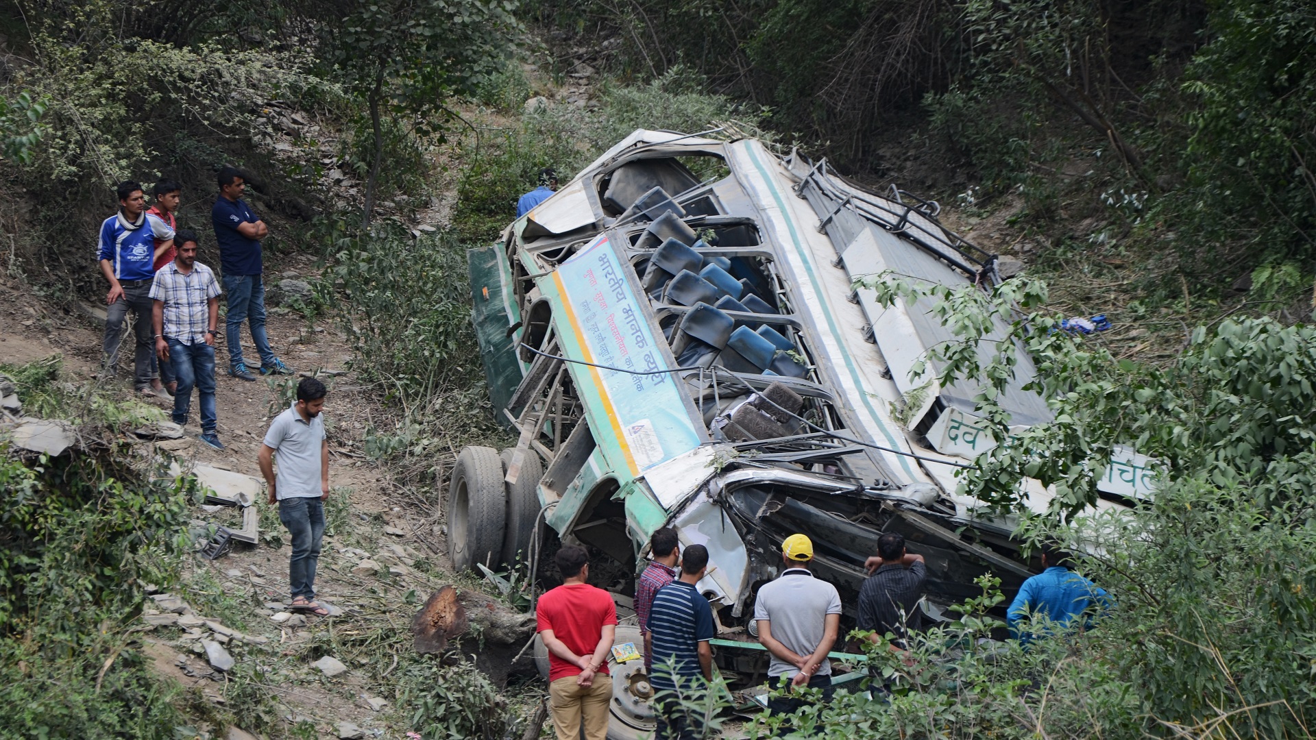 Image for the title: At least 13 dead in India accident after pick-up falls into gorge 