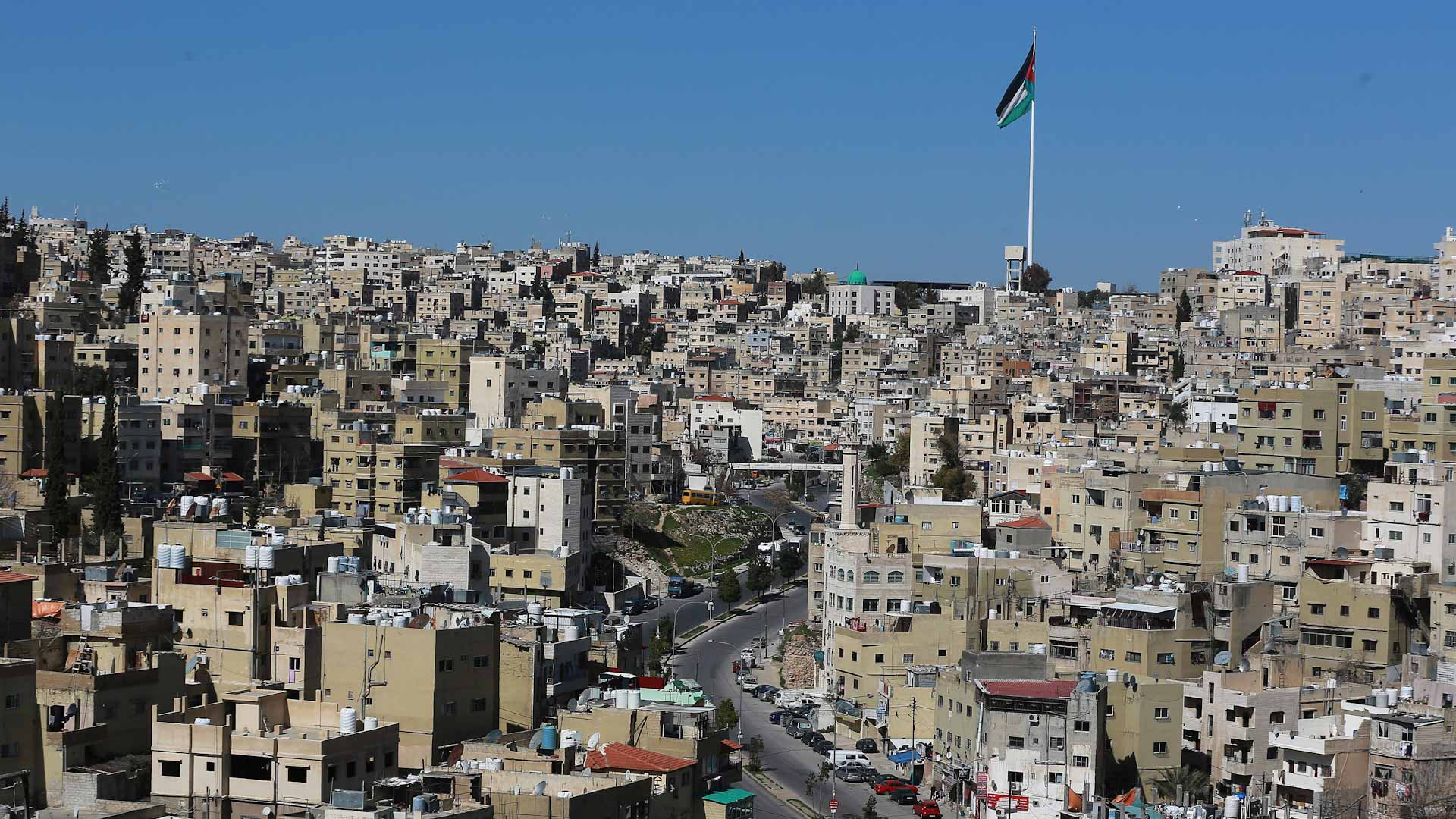 Image for the title: Jordan warns it will expel unvaccinated foreign workers 