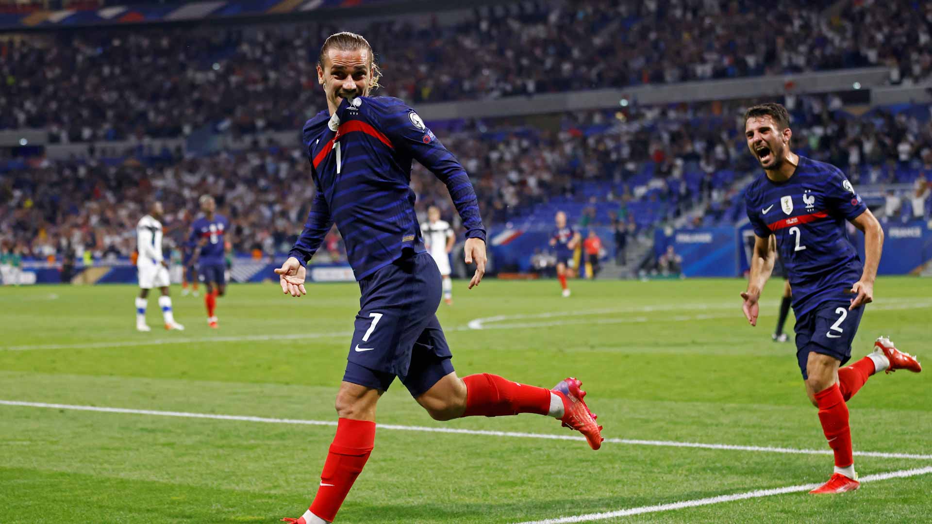 Image for the title: Griezmann double fires France to victory over Finland 