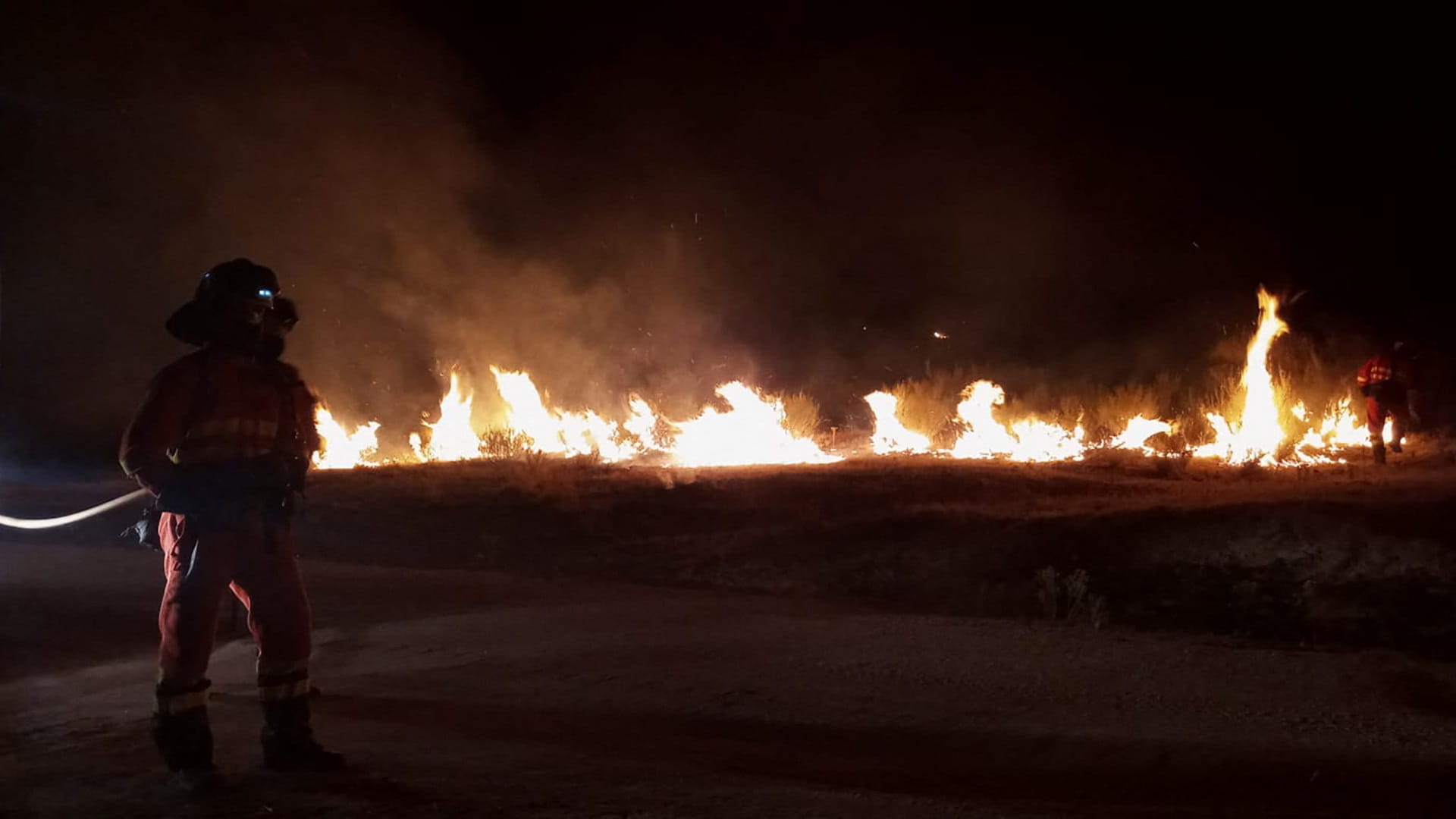 Image for the title: Villagers flee homes as Spanish wildfire blazes for fifth day 