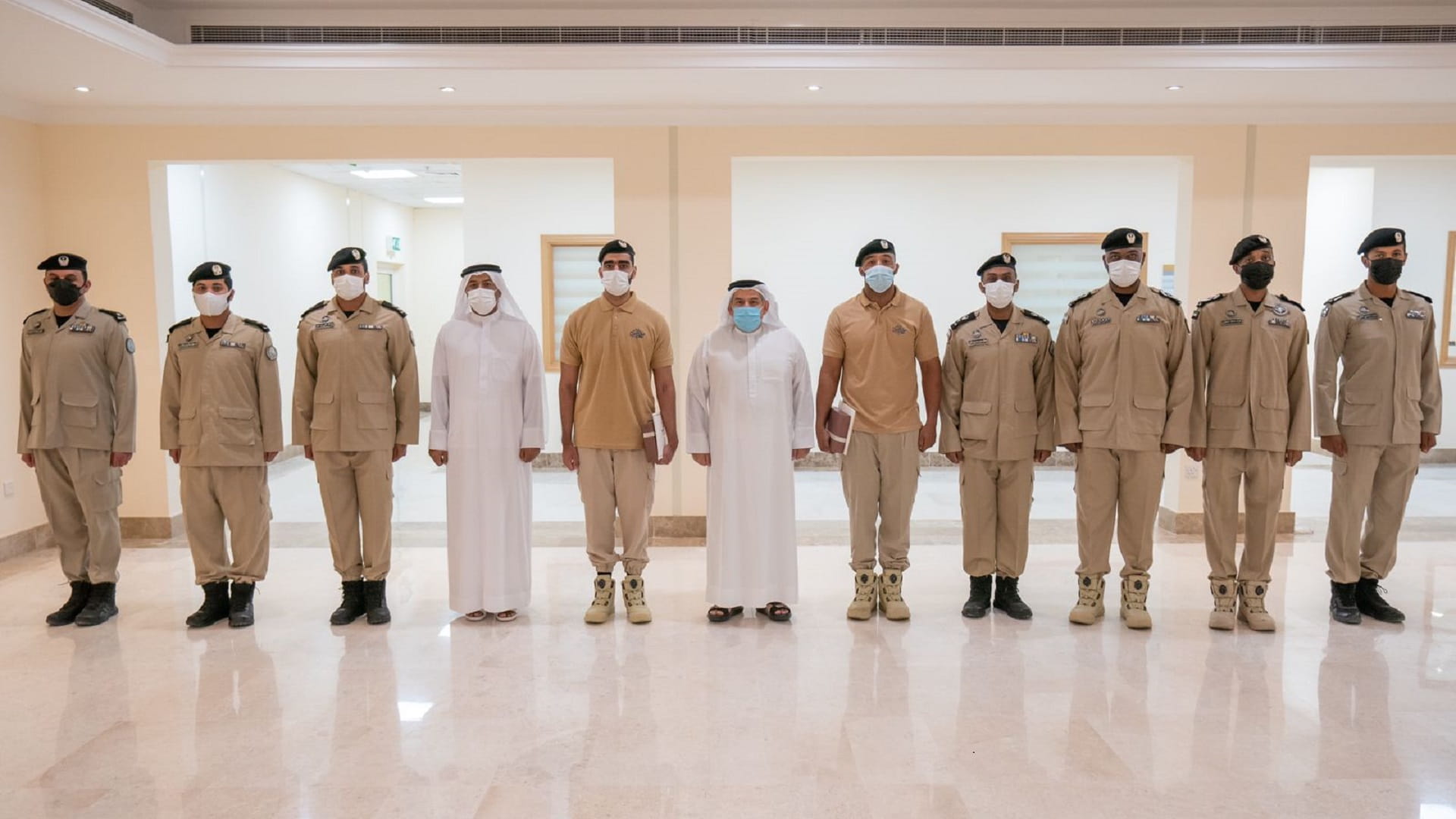 Image for the title: 'Director General of Emiri Guard' honours 2 employees  