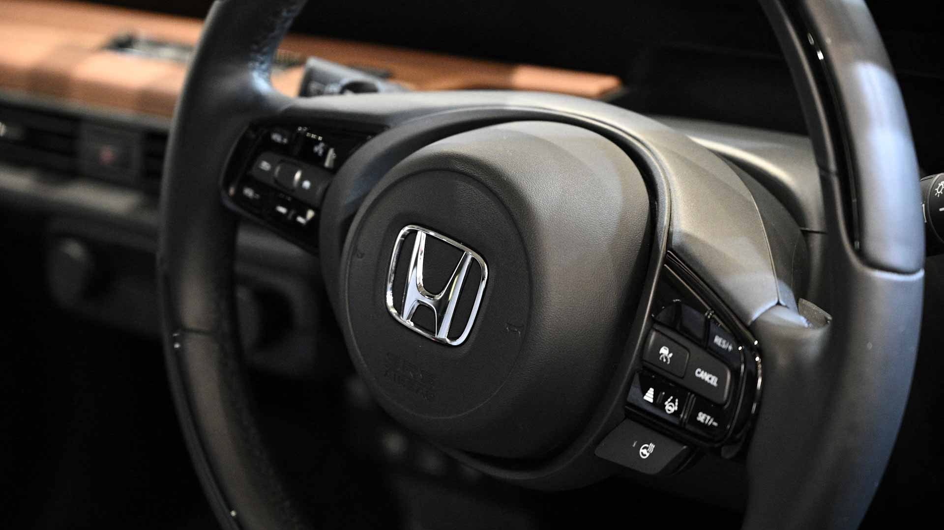 Image for the title: Honda recalling 1.3 mln vehicles worldwide for rear camera issue 