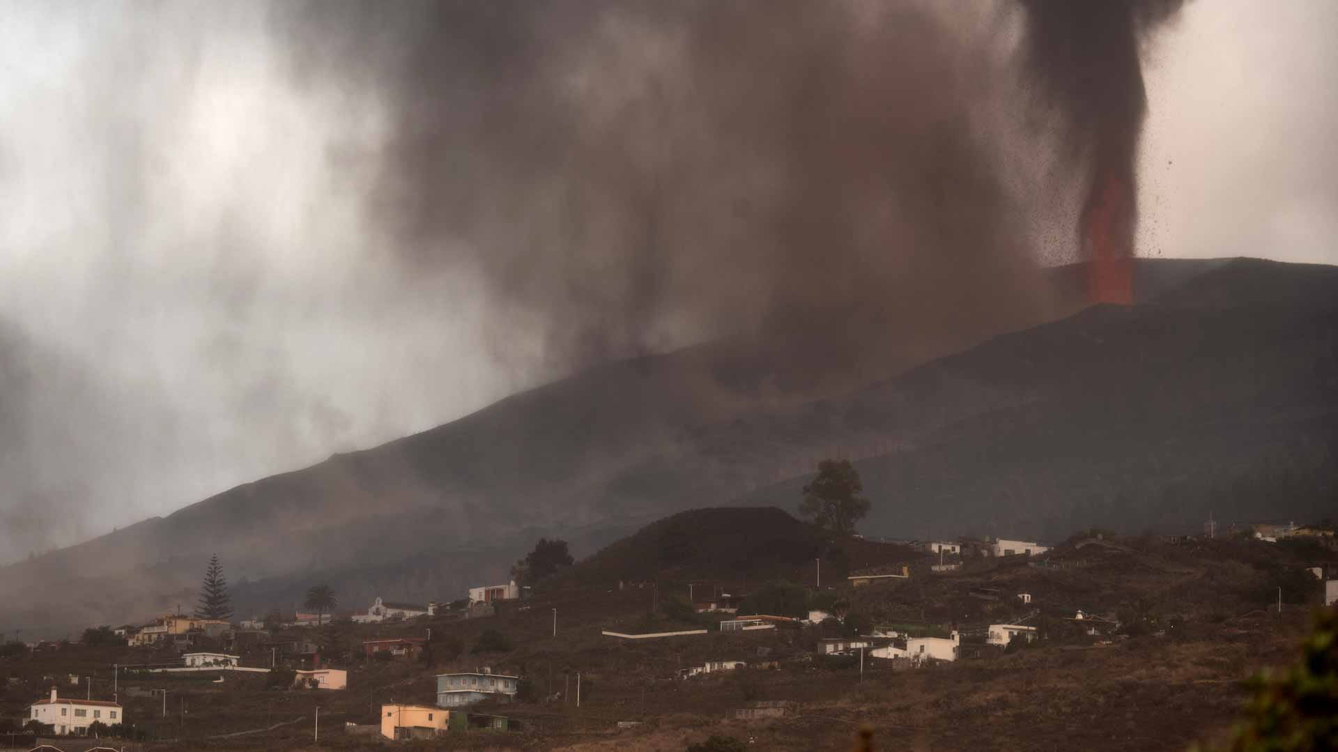 Image for the title: Canaries volcano blasts lava into the air as ash blankets area 