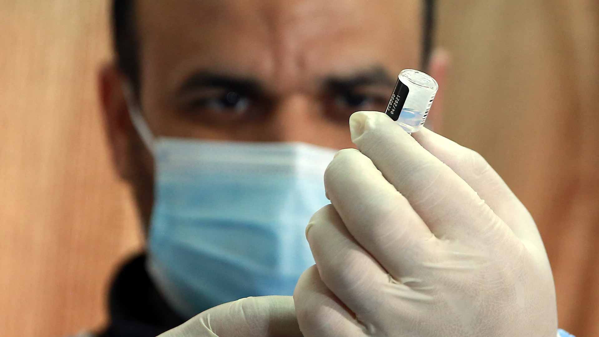 Image for the title: Syria coronavirus spike sees hospitals reach capacity 