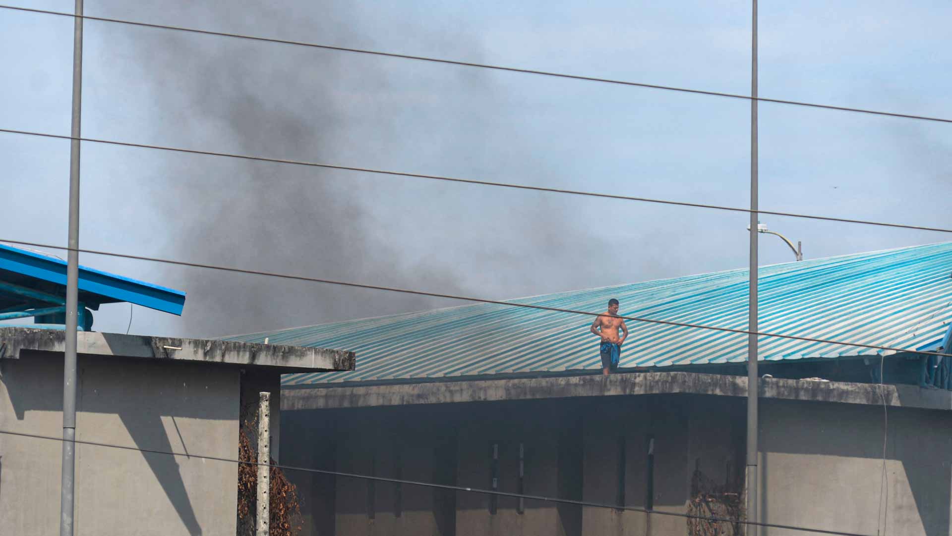 Image for the title: 24 dead in Ecuador prison gun battle: police 