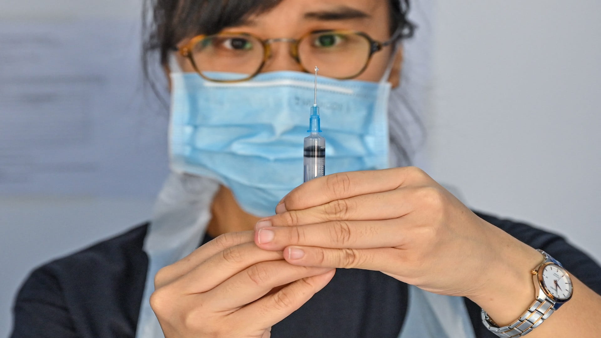 Image for the title: Malaysia approves Sinovac's COVID-19 vaccine for ages 12 to 17 