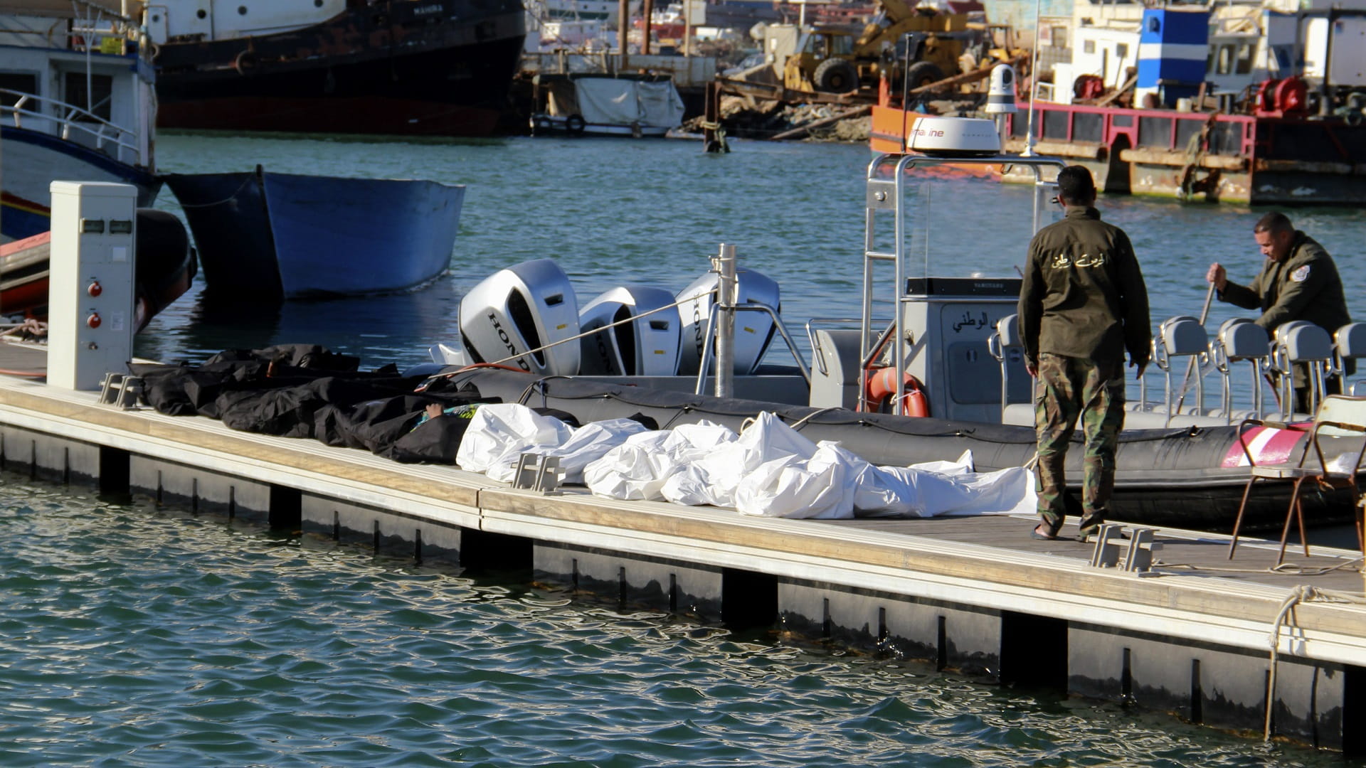 Image for the title: At least 13 die as two migrant boats sink off Tunisia 