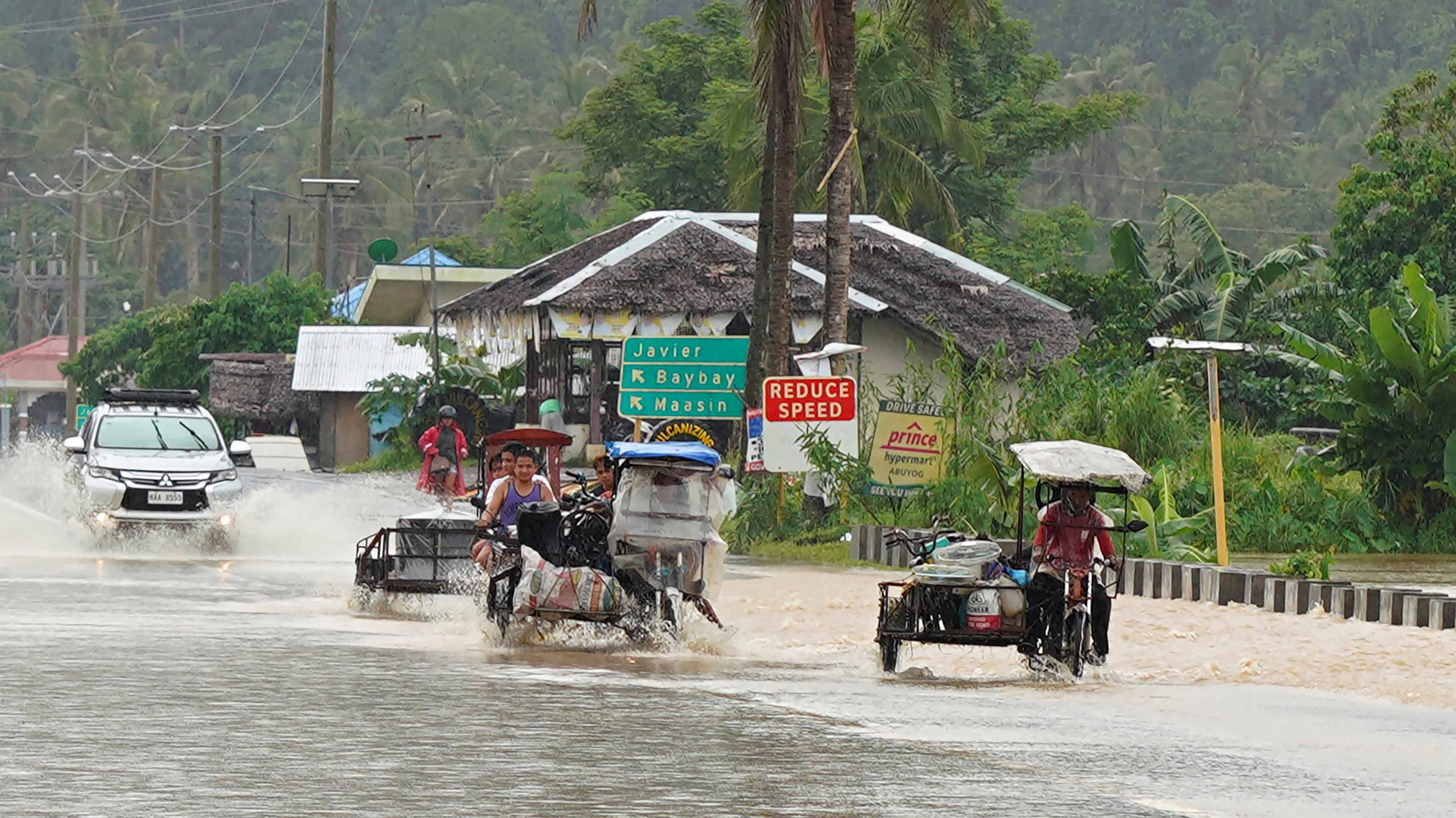 Image for the title: Tropical storm Megi hits Philippines, leaving at least 25 dead 