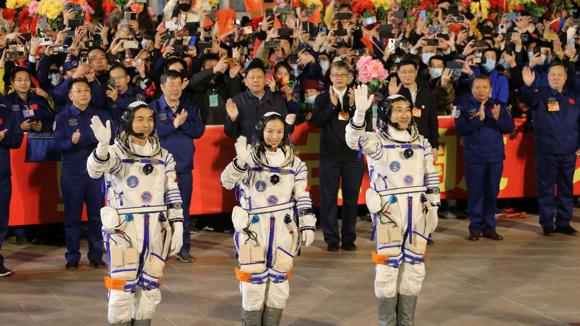 Image for the title: Three Chinese astronauts return to Earth after six months in space 