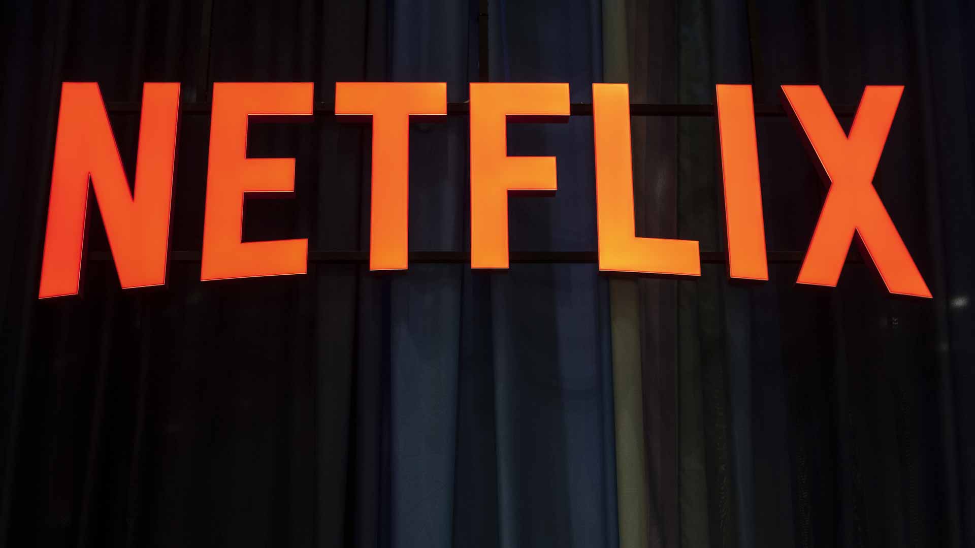 Image for the title: Netflix shares plunge as subscribers drop 