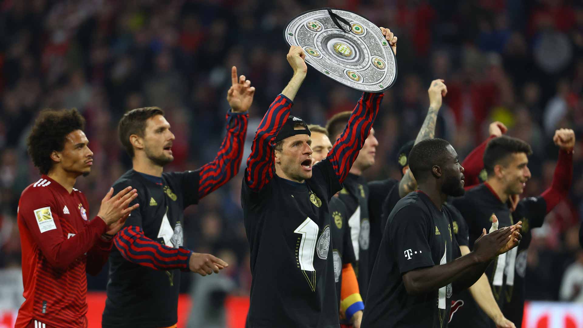 Image for the title: Bayern win 10th straight league title after beating Dortmund 