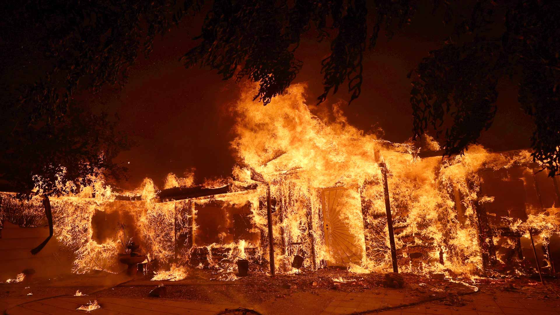 Image for the title: California forest fire kills 2, rainfall helps fight flames 