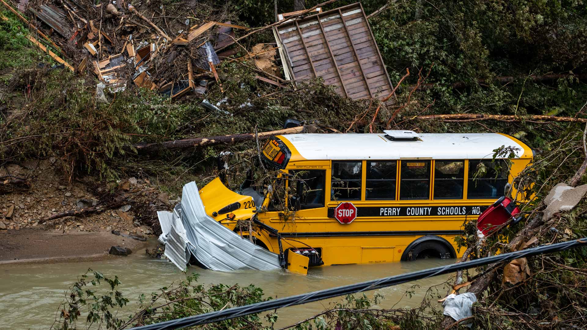 Image for the title: Kentucky floods kill at least 37 as more storms forecast 