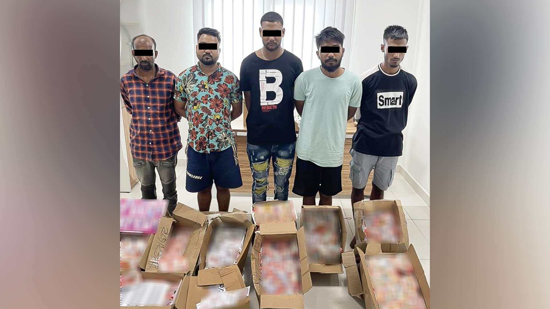 Image for the title: 'Massage card' gang behind bars thanks to Sharjah Police 