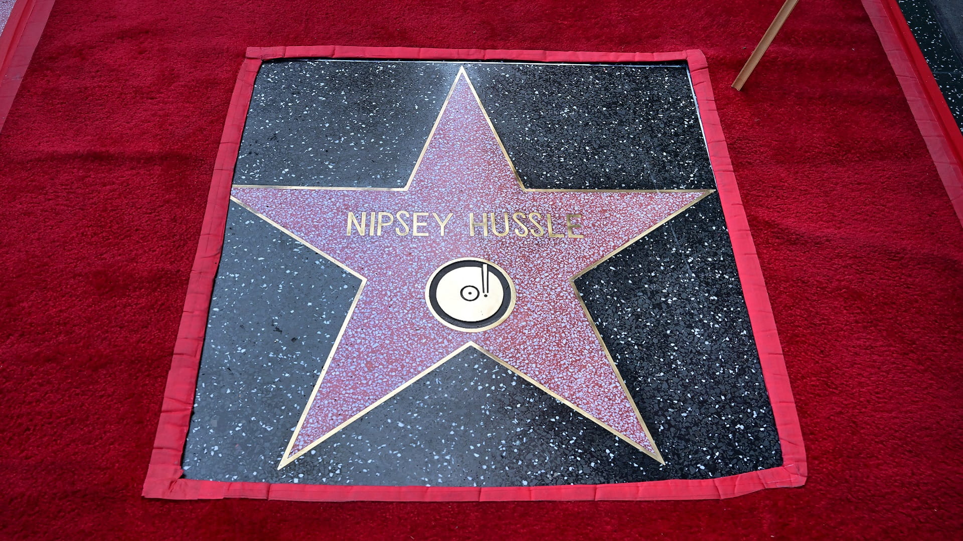 Image for the title: Nipsey Hussle gets posthumous Hollywood star 