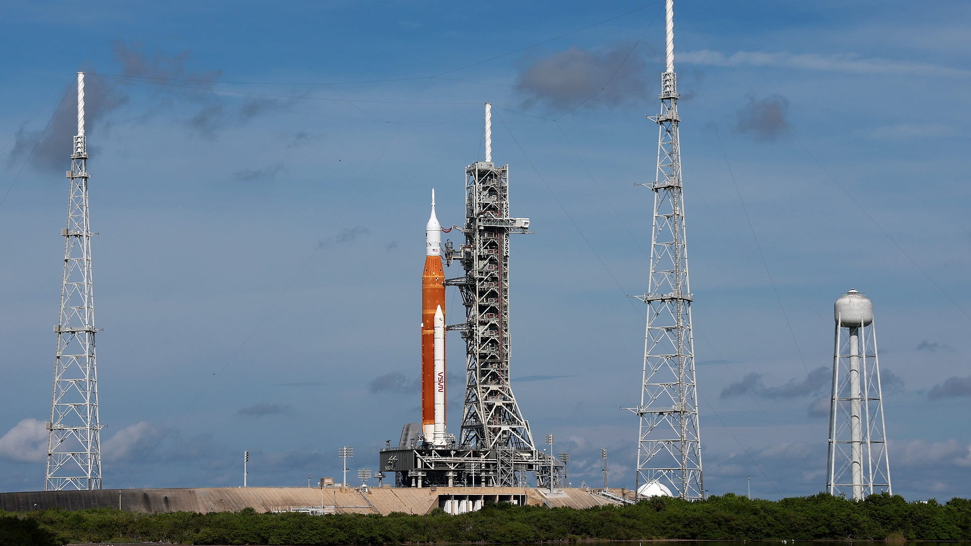 Image for the title: NASA moon rocket on track for launch despite lightning hits 