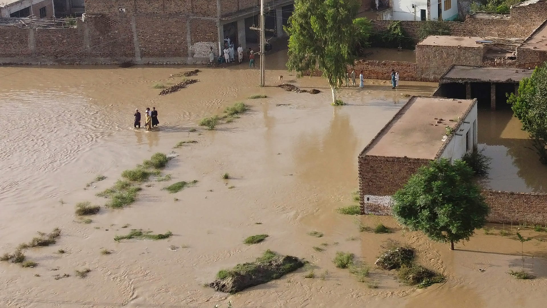 Image for the title: Tens of millions battle Pakistan floods as death toll rises 