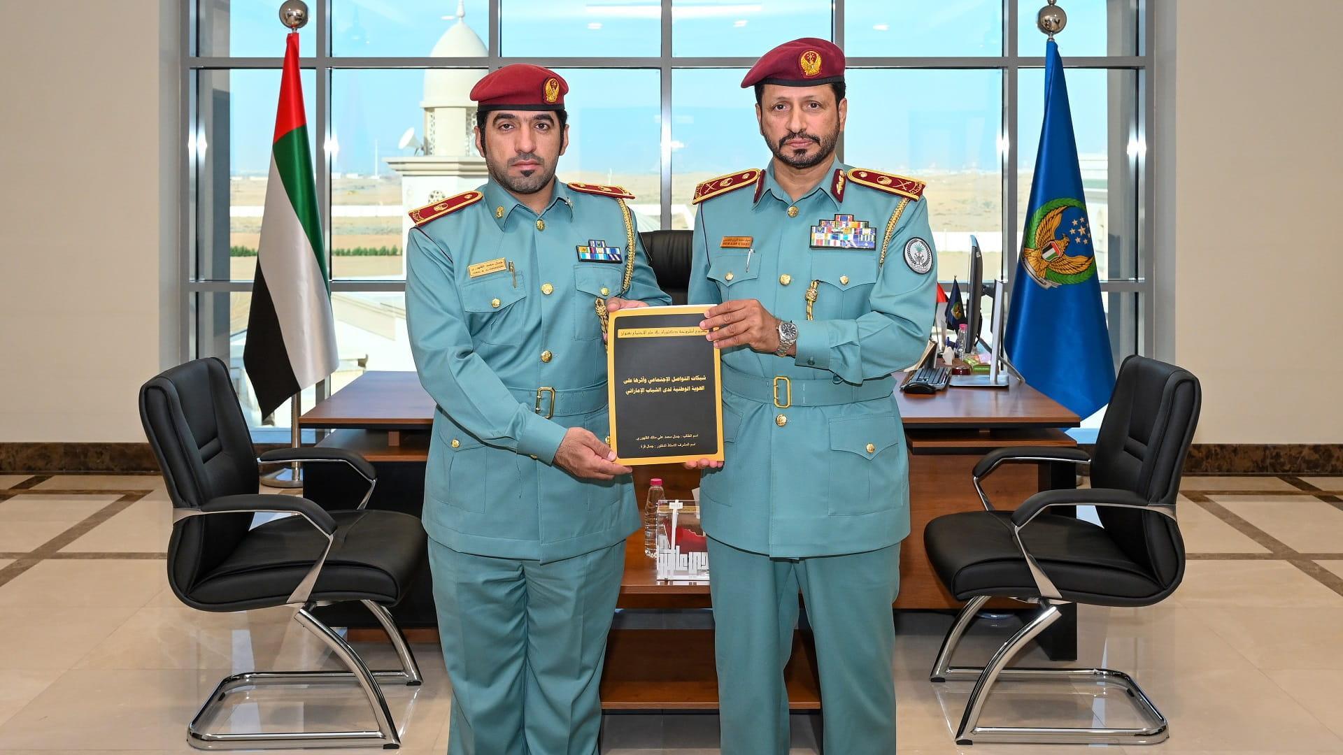 Image for the title: SP Commander-in-Chief honors an officer for obtaining PhD 