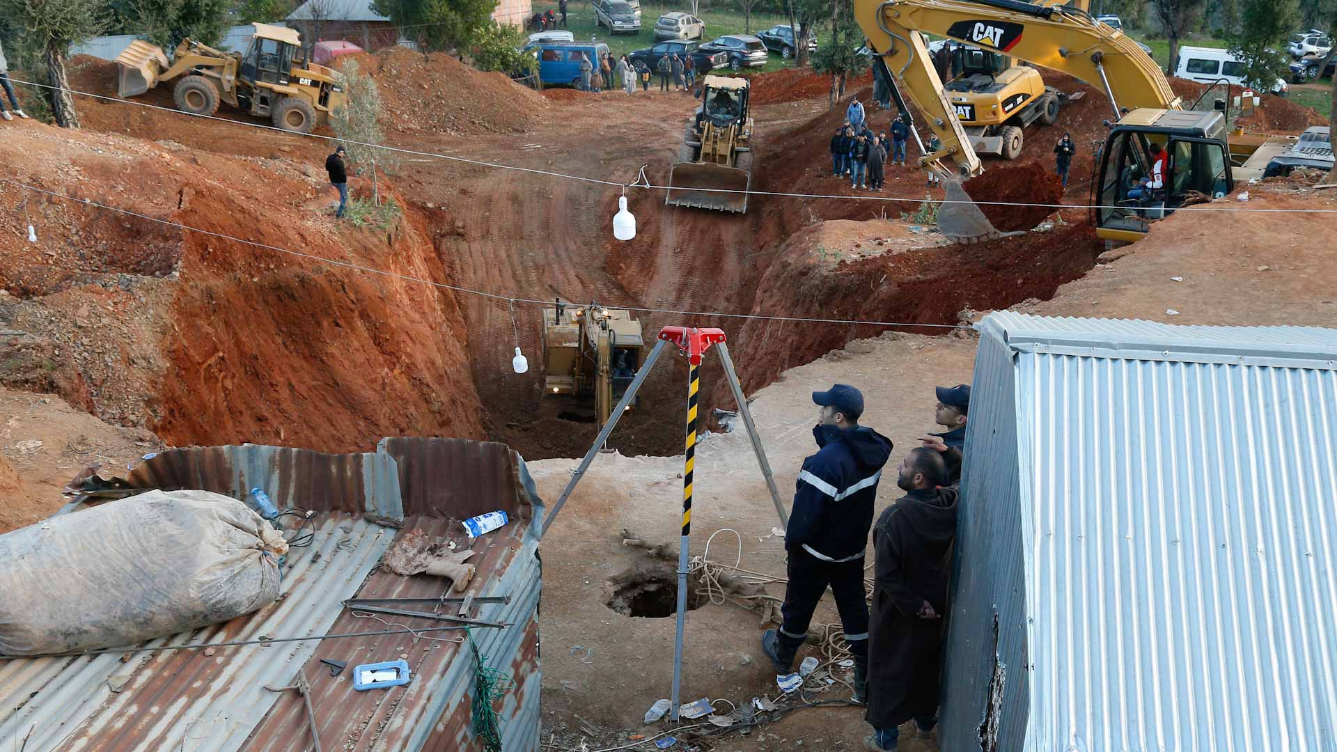 Image for the title: Morocco rescuers dig for boy trapped in well 