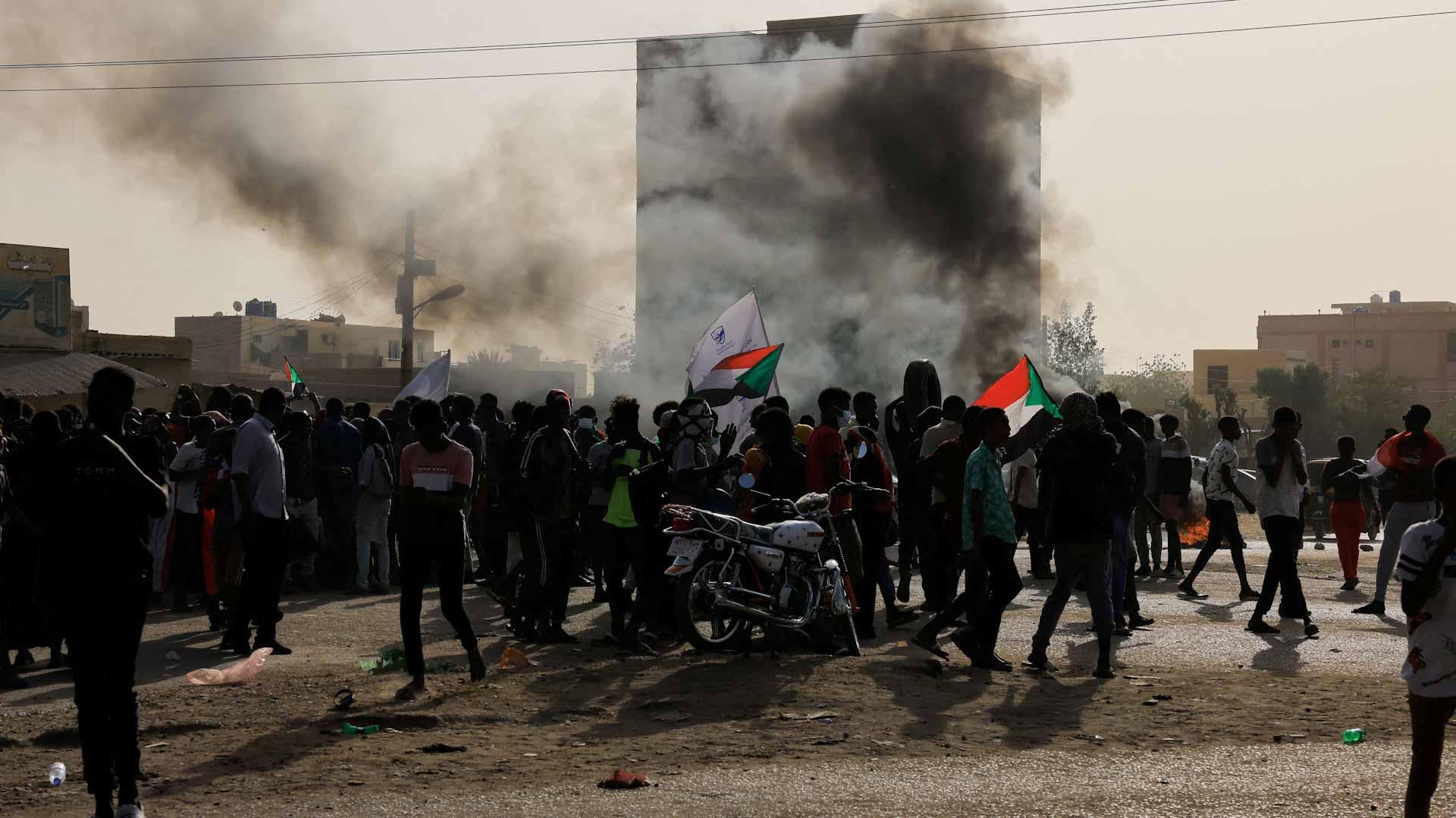 Image for the title: Protesters take to Sudan's streets, decrying coup and arrests 