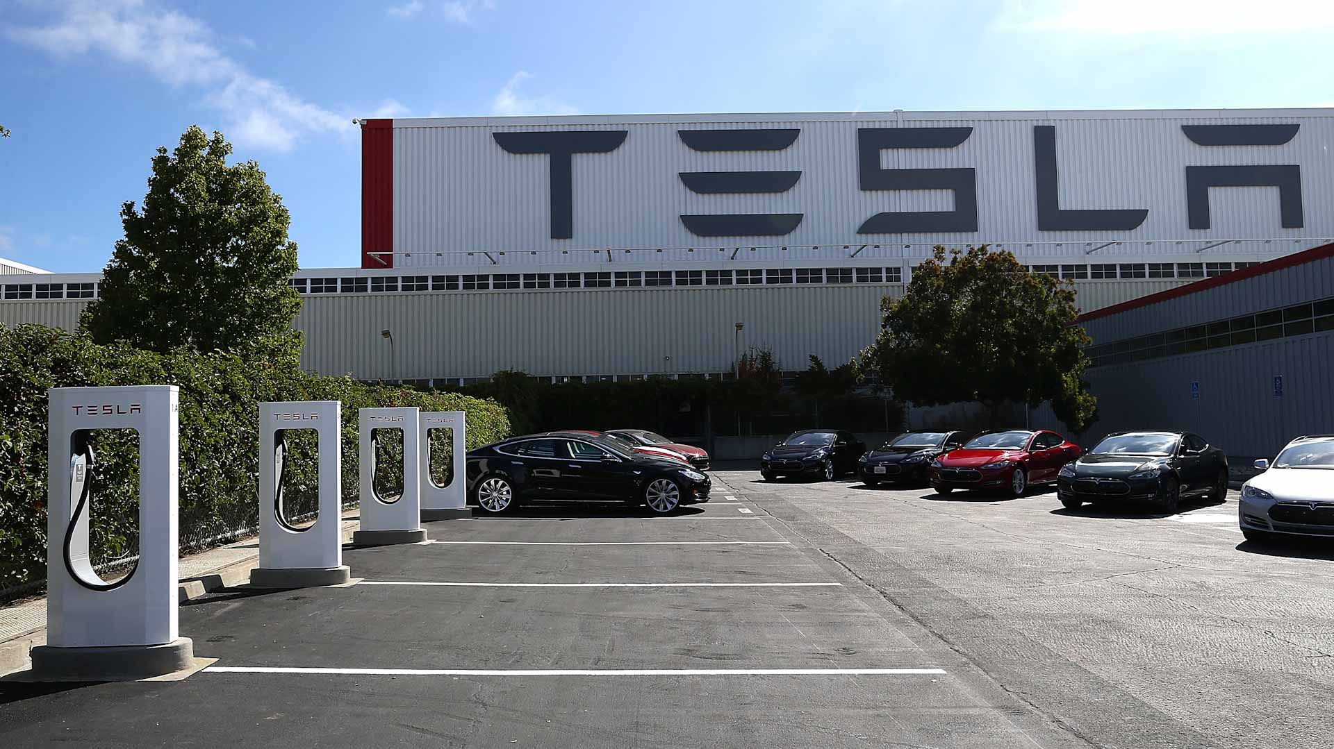 Image for the title: Tesla recalls over 500,000 US vehicles to fix pedestrian warning 