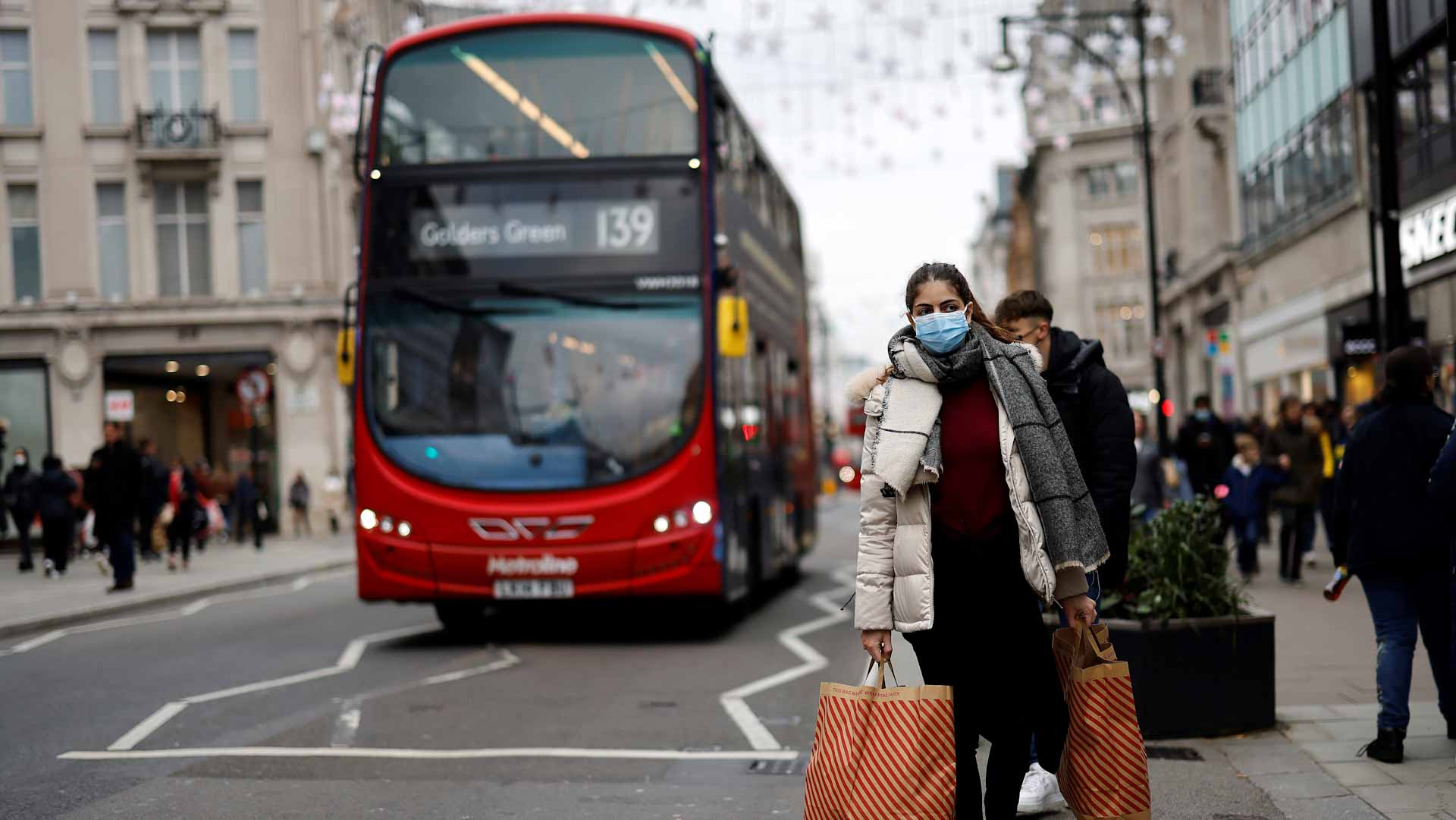 Image for the title: UK economy rebounds by record 7.5% from pandemic in 2021 