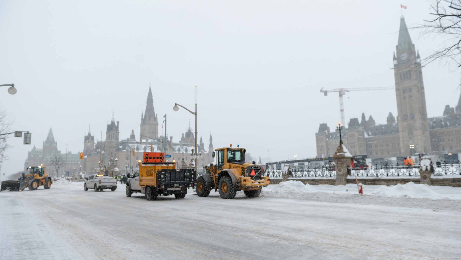 Image for the title: Police reclaim Canada capital after trucker siege ends 