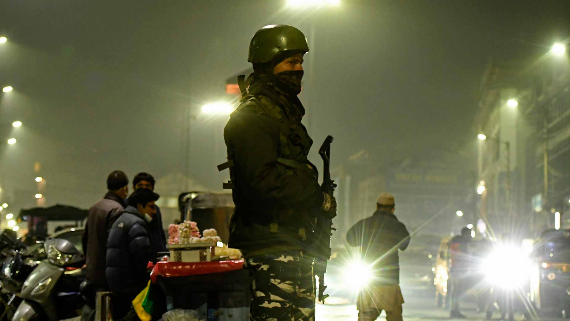 Image for the title: At least 12 killed in stampede at religious shrine in Kashmir 