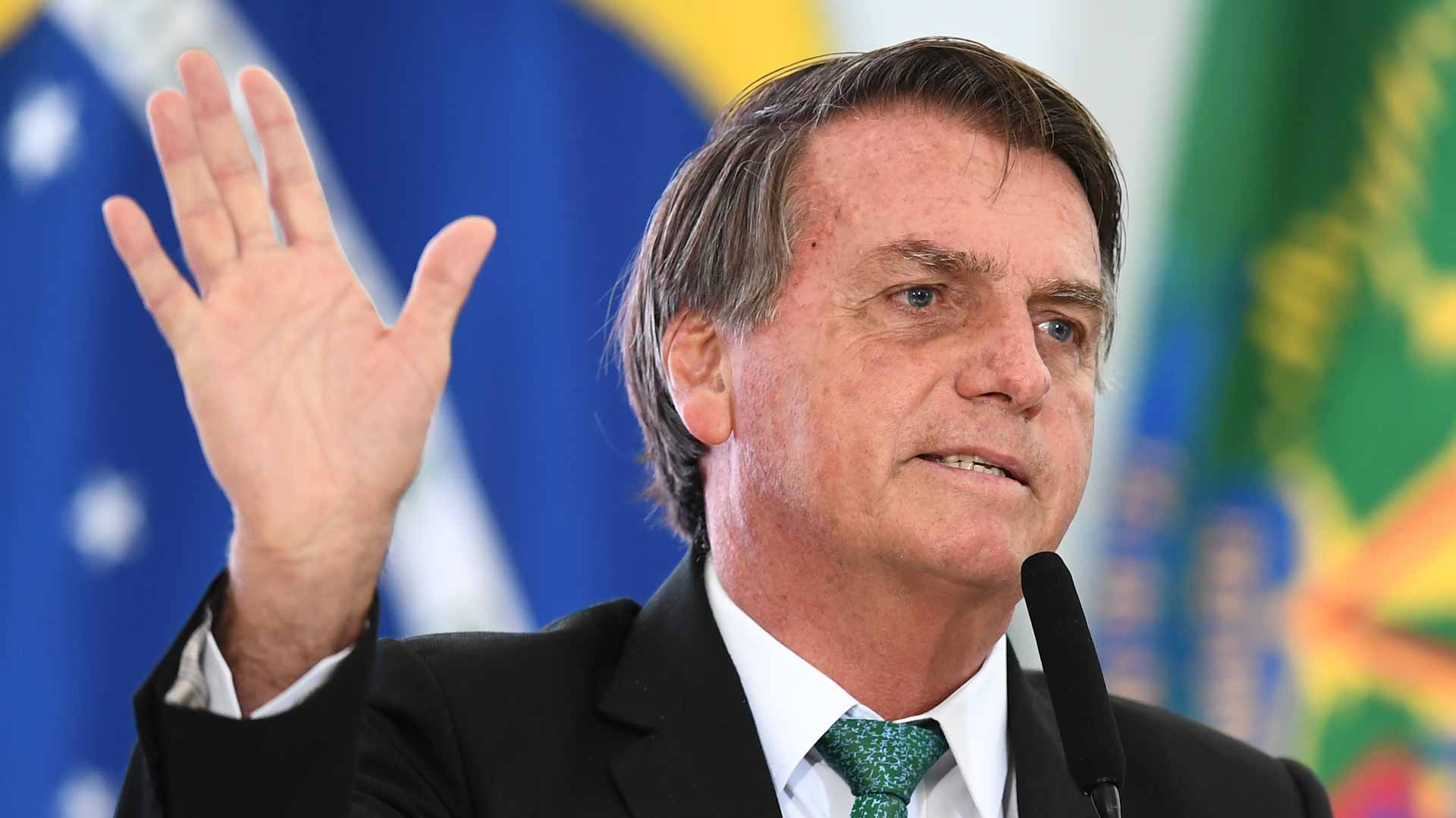 Image for the title: Brazil's Bolsonaro taken to hospital with abdominal pain 