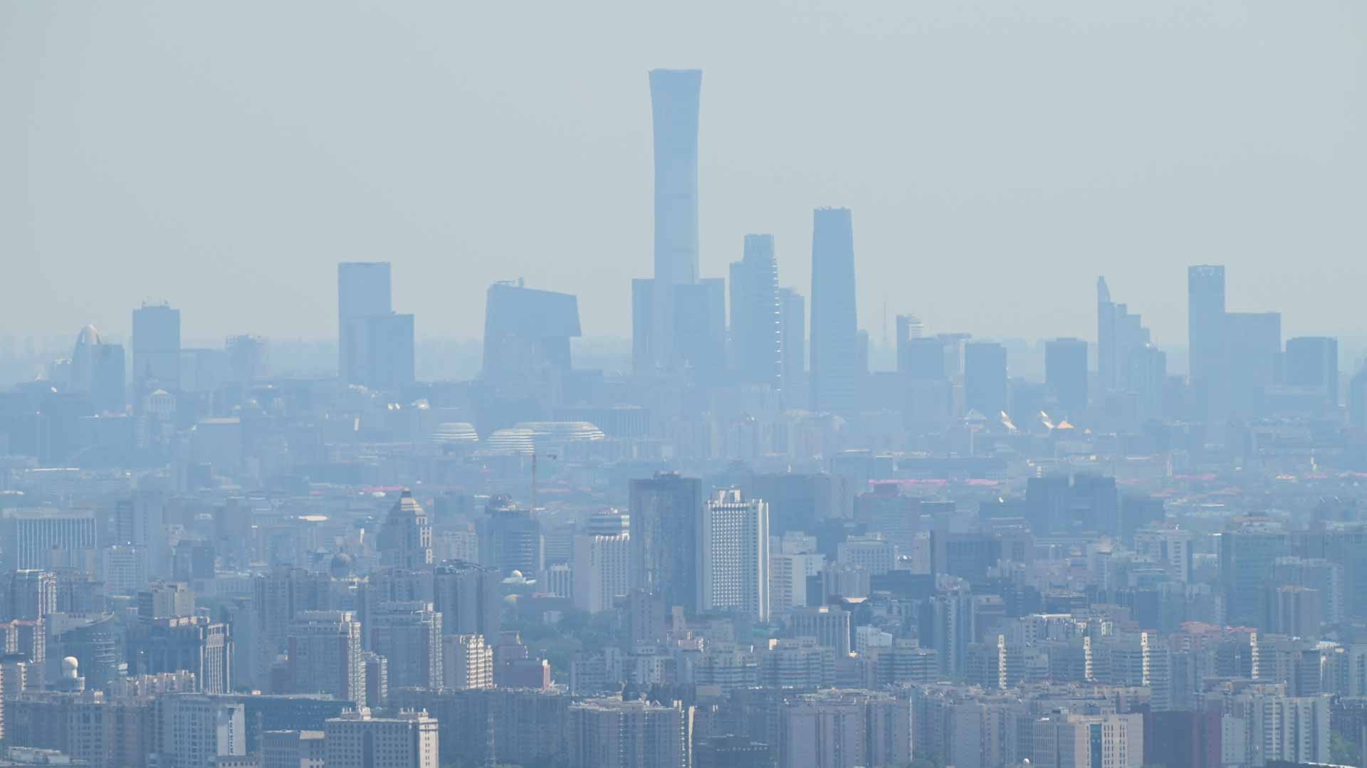 Image for the title: Beijing meets state air quality standards for first time in 2021 