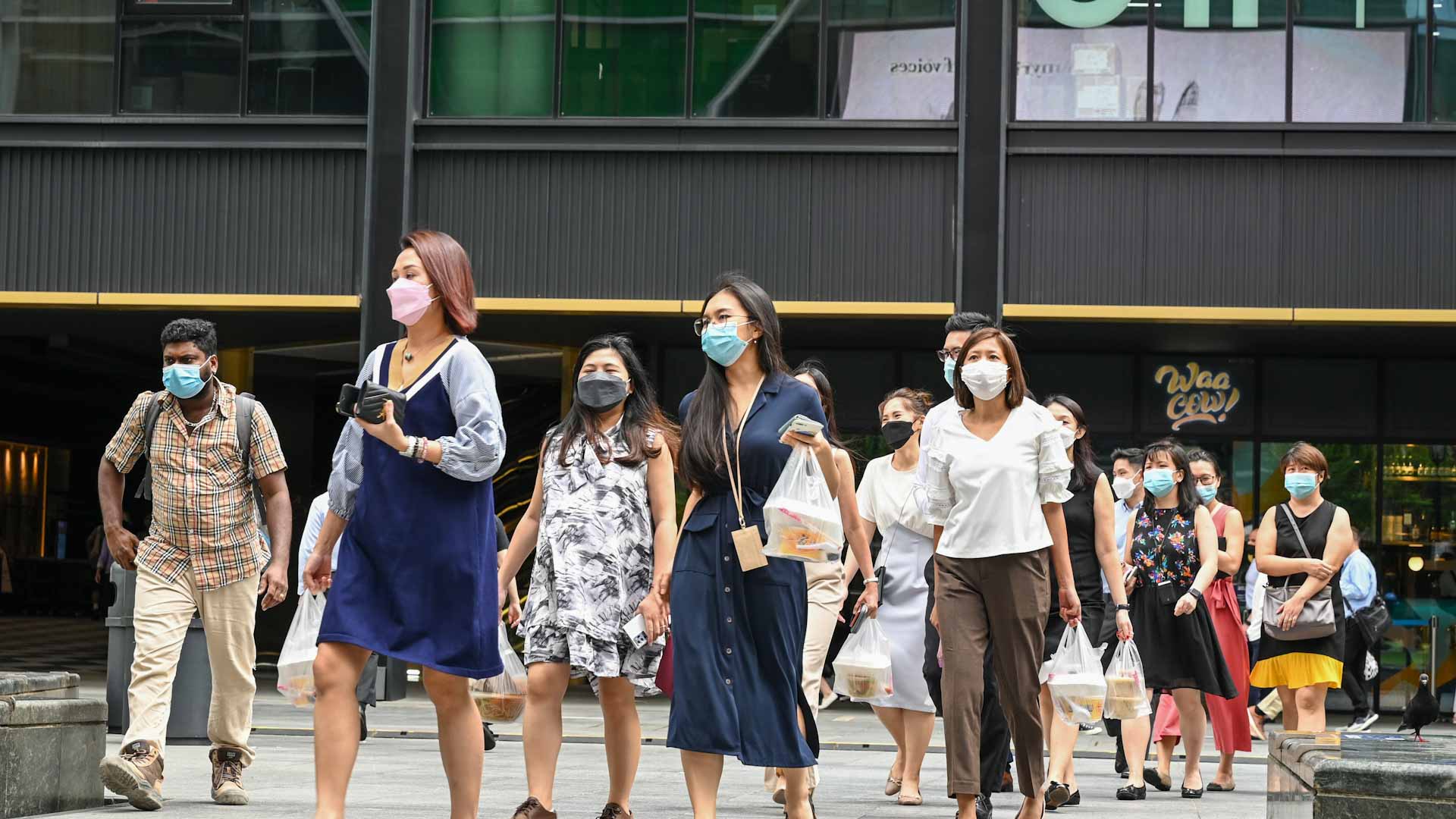 Image for the title: Singapore sees Omicron coronavirus wave outpacing Delta 