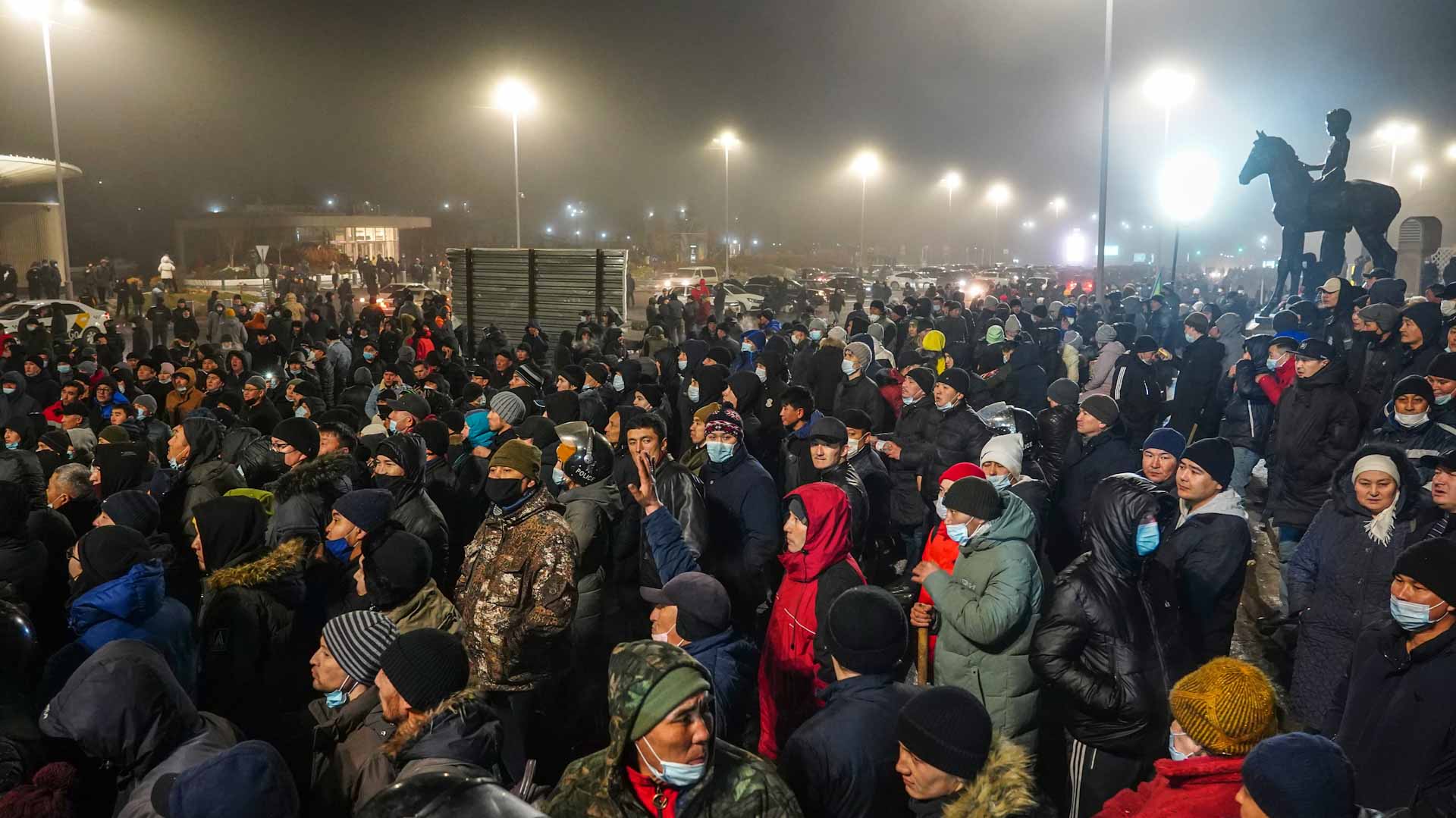 Image for the title: Troops, protesters clash on Almaty main square in Kazakhstan 
