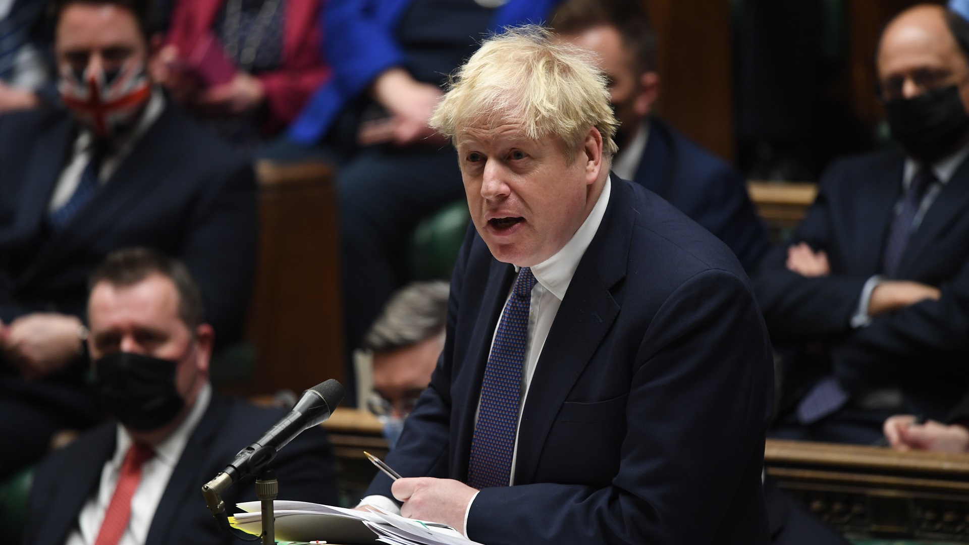 Image for the title: UK PM Johnson 'looking at' cutting COVID-19 isolation period 