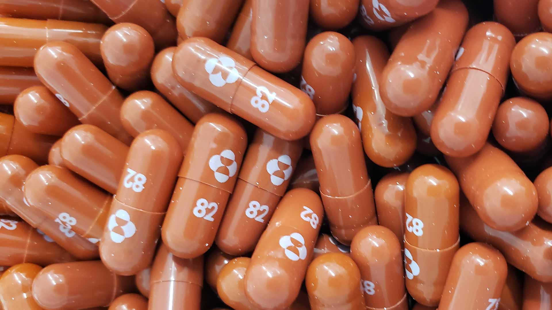 Image for the title: Indonesia approves Merck's COVID-19 pill for emergency use 