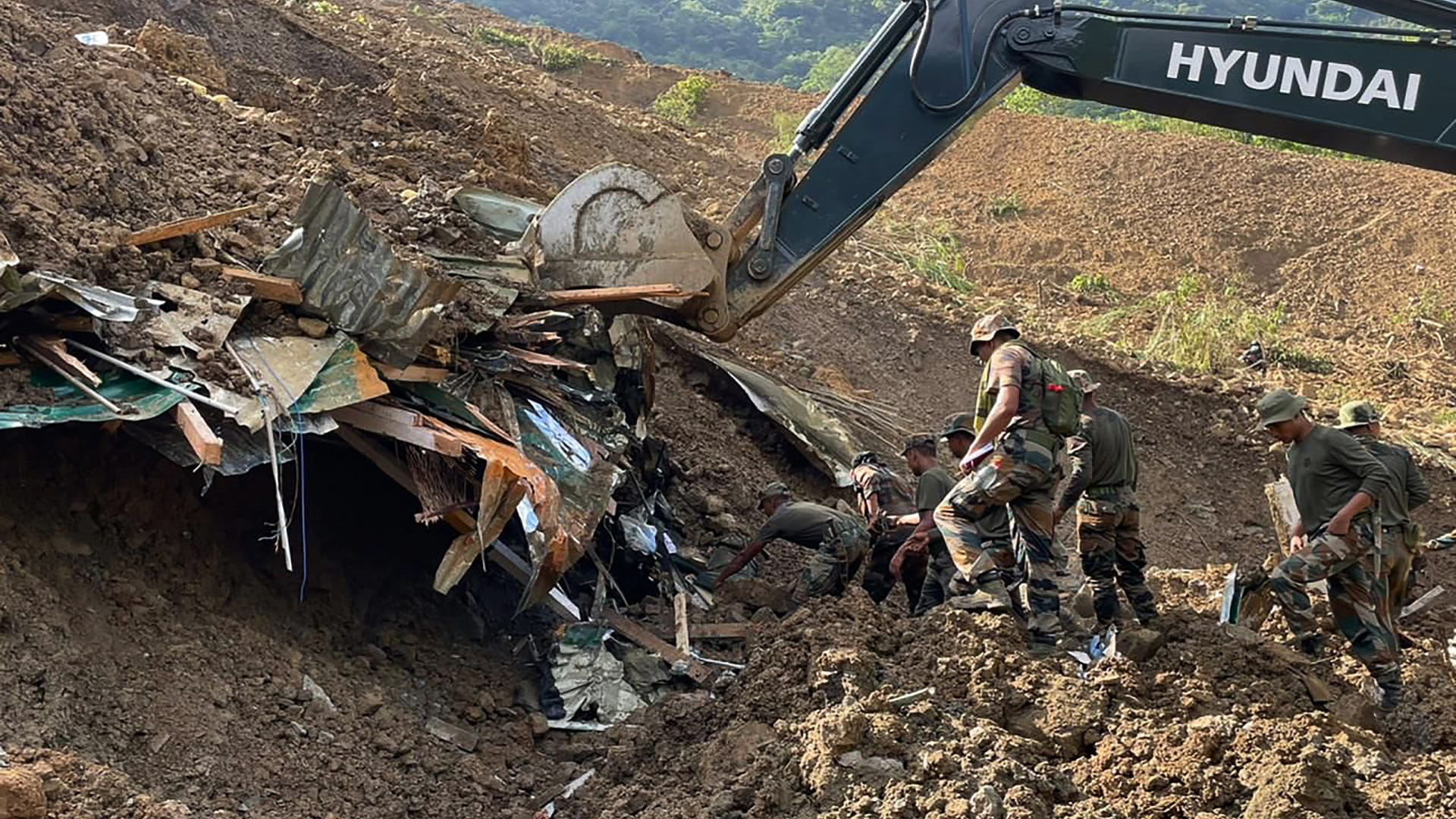 Image for the title: Death toll from northeast India landslide rises to 20 