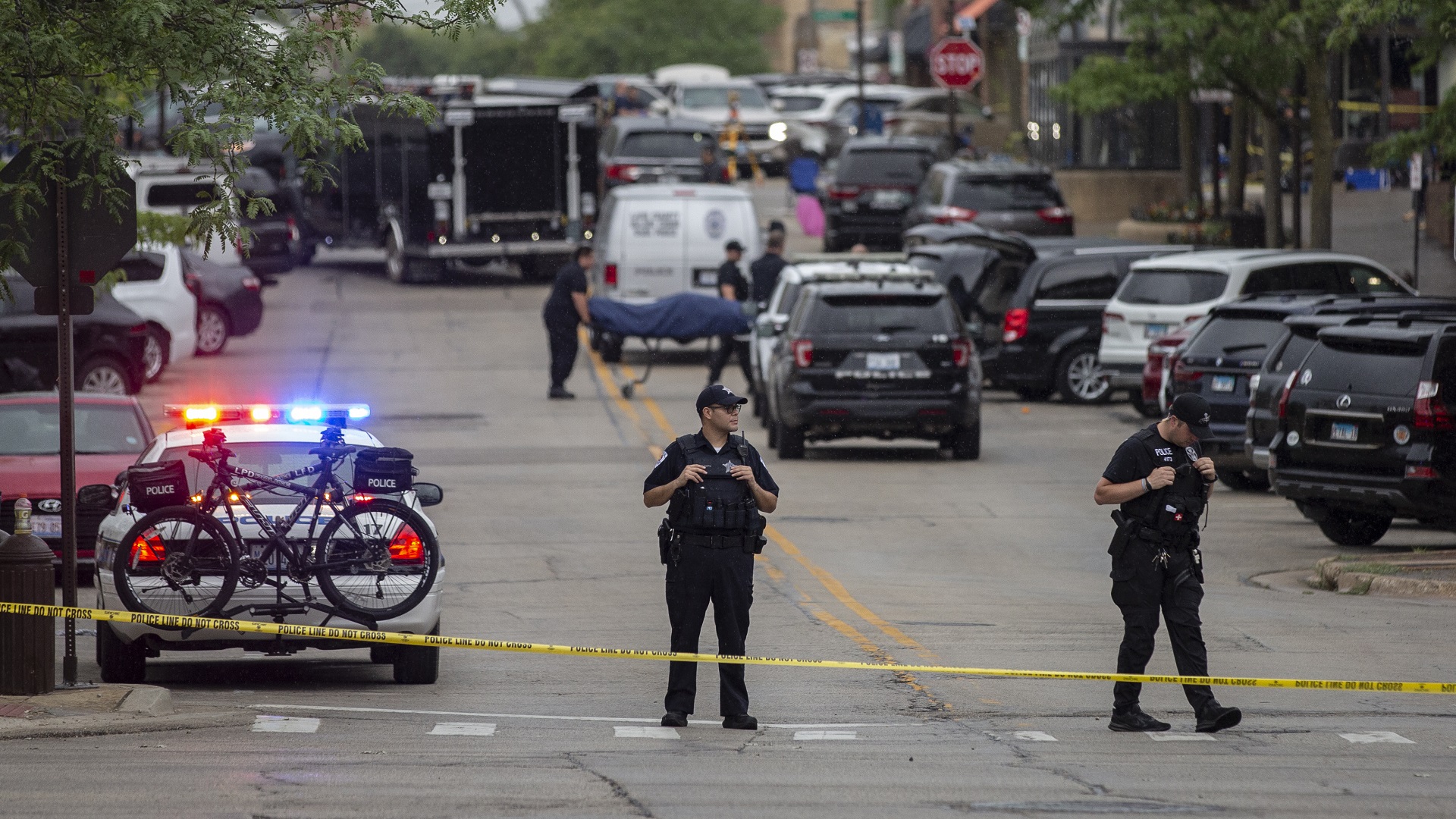 Image for the title: Rooftop shooter kills six at July 4th parade in Chicago suburb 