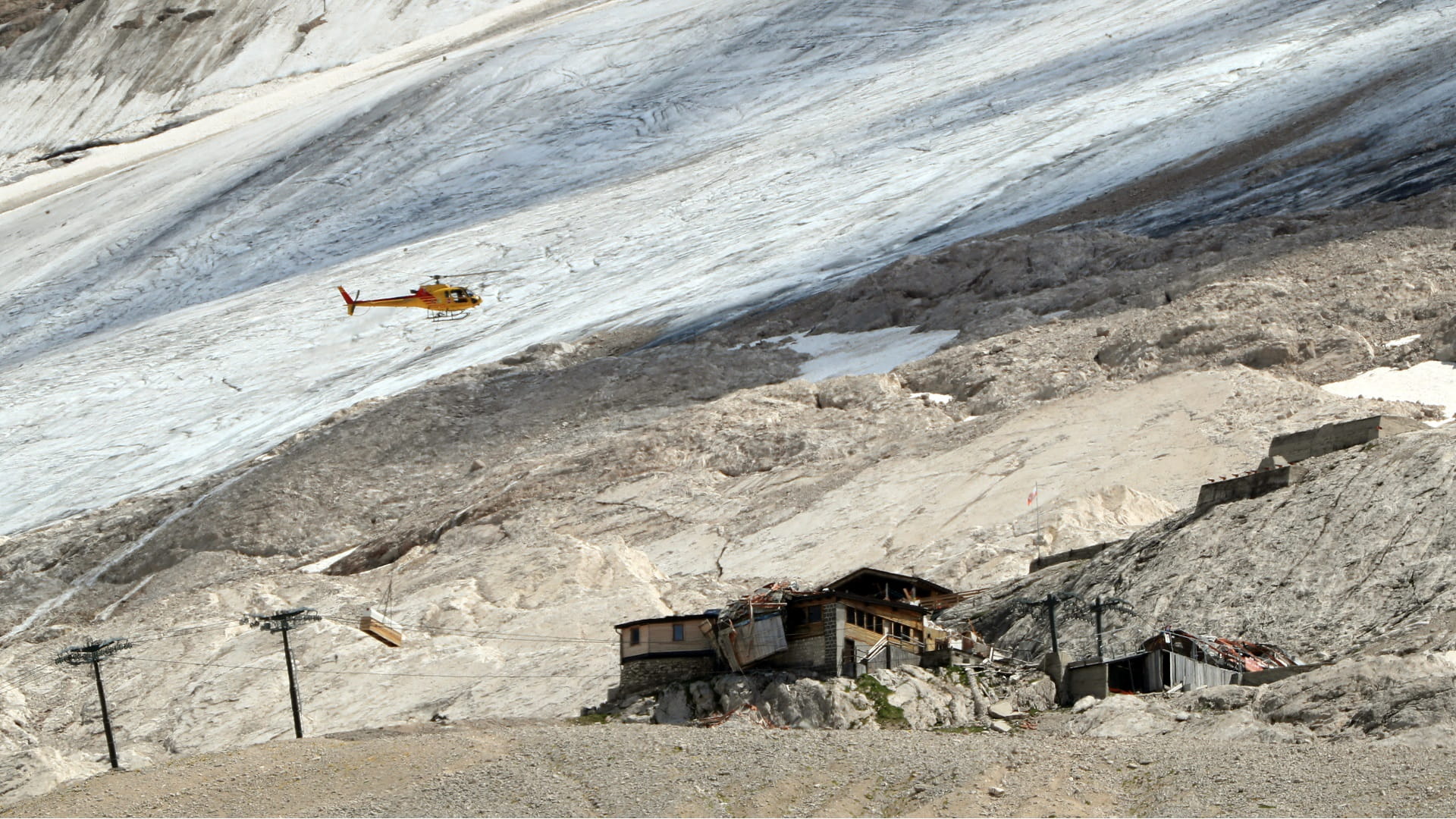 Image for the title: Death toll climbs to 11 in Italy glacier collapse 