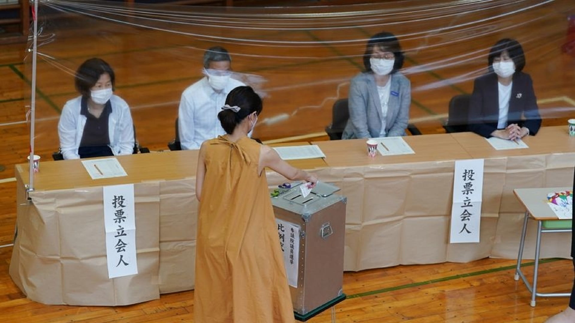 Image for the title: Japanese voters went to polls on Sunday for upper house election 